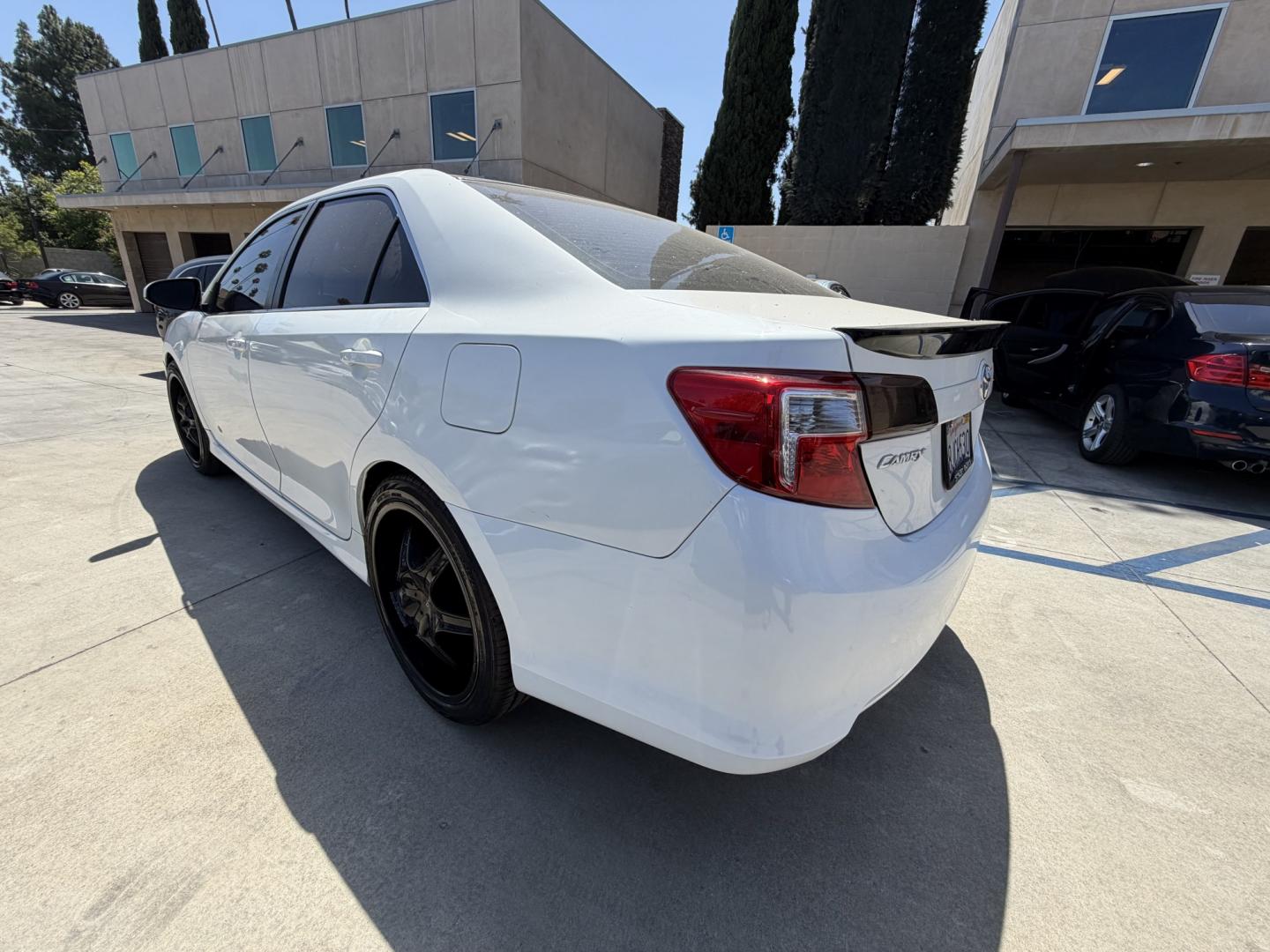 2014 White Toyota Camry SE (4T1BF1FK9EU) with an 2.5L L4 DOHC 16V engine, 6-Speed Automatic transmission, located at 30 S. Berkeley Avenue, Pasadena, CA, 91107, (626) 248-7567, 34.145447, -118.109398 - Back up camera! Bluetooth! Fog Lights! Premium Wheels! This Toyota looks and drives good. Climate Control! Heate! Low Miles! This Camry SE looks and drives good. It comes well equipped with, Power Driver Seat,Power Passenger Seat,Tire Pressure Monitor , climate control, and a lot more . Call us wi- Photo#2