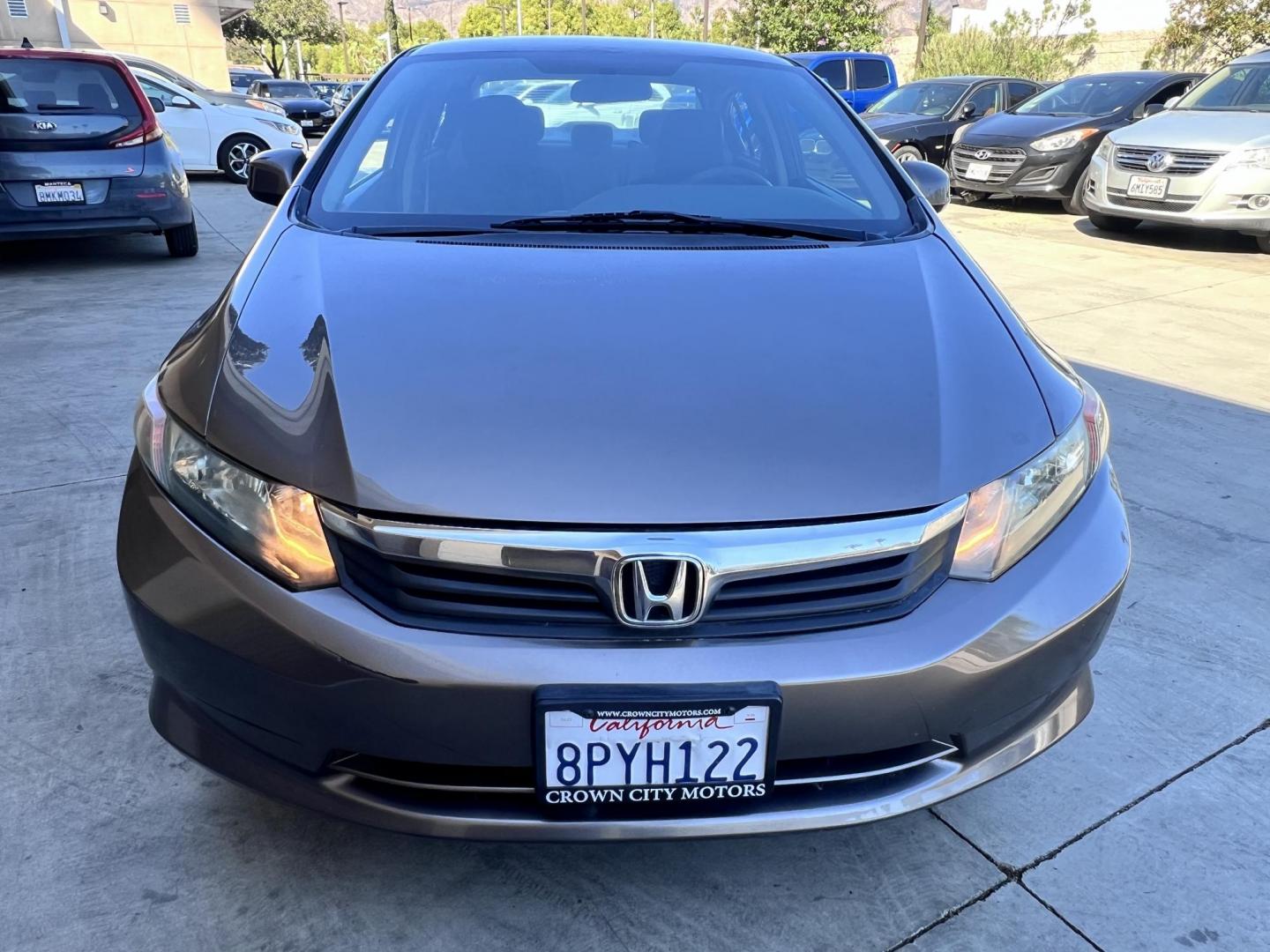 2012 Urban Titanium Metallic /Tan Honda Civic LX Sedan 5-Speed AT (19XFB2F59CE) with an 1.8L L4 SOHC 16V engine, 5-Speed Automatic transmission, located at 30 S. Berkeley Avenue, Pasadena, CA, 91107, (626) 248-7567, 34.145447, -118.109398 - 2012 Honda Civic – Reliable Sedan with Buy Here Pay Here Financing in Pasadena, CA If you’re searching for a dependable, fuel-efficient, and affordable car that also qualifies for Buy Here Pay Here financing in Pasadena, this 2012 Honda Civic is an excellent choice. Known for its long-lasting - Photo#6