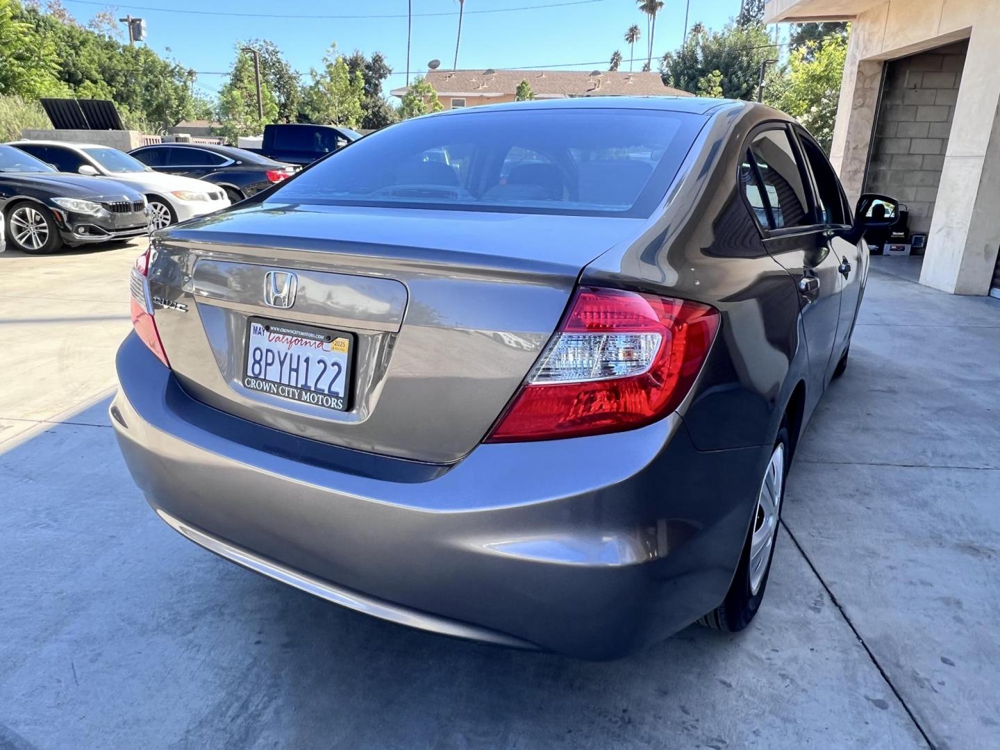 2012 Urban Titanium Metallic /Tan Honda Civic LX Sedan 5-Speed AT (19XFB2F59CE) with an 1.8L L4 SOHC 16V engine, 5-Speed Automatic transmission, located at 30 S. Berkeley Avenue, Pasadena, CA, 91107, (626) 248-7567, 34.145447, -118.109398 - 2012 Honda Civic – Reliable Sedan with Buy Here Pay Here Financing in Pasadena, CA If you’re searching for a dependable, fuel-efficient, and affordable car that also qualifies for Buy Here Pay Here financing in Pasadena, this 2012 Honda Civic is an excellent choice. Known for its long-lasting - Photo#7