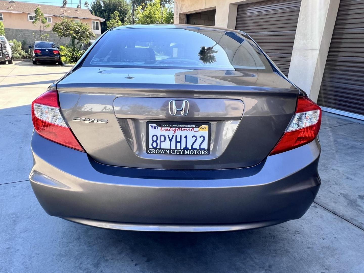 2012 Urban Titanium Metallic /Tan Honda Civic LX Sedan 5-Speed AT (19XFB2F59CE) with an 1.8L L4 SOHC 16V engine, 5-Speed Automatic transmission, located at 30 S. Berkeley Avenue, Pasadena, CA, 91107, (626) 248-7567, 34.145447, -118.109398 - 2012 Honda Civic – Reliable Sedan with Buy Here Pay Here Financing in Pasadena, CA If you’re searching for a dependable, fuel-efficient, and affordable car that also qualifies for Buy Here Pay Here financing in Pasadena, this 2012 Honda Civic is an excellent choice. Known for its long-lasting - Photo#8