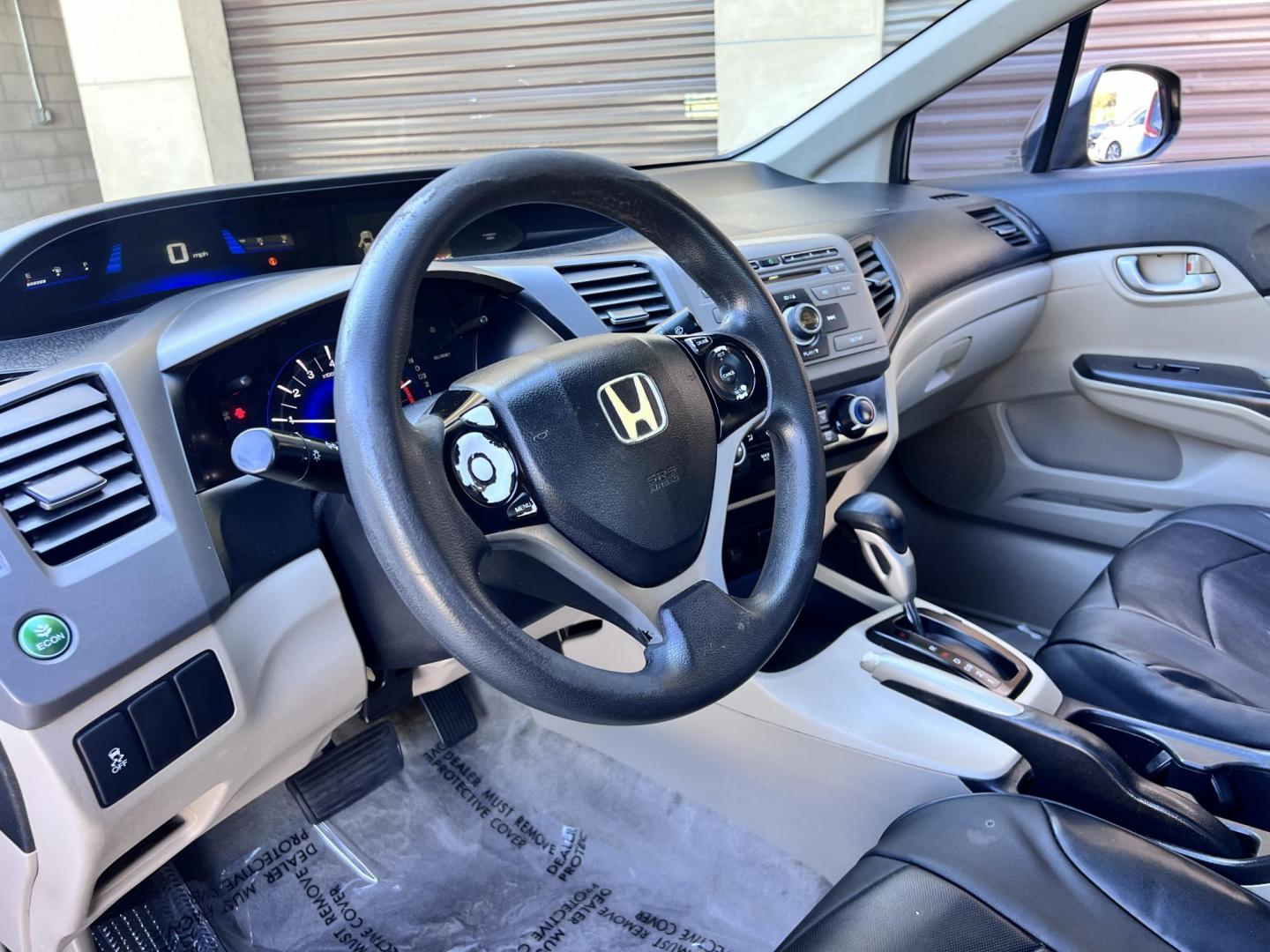 2012 Urban Titanium Metallic /Tan Honda Civic LX Sedan 5-Speed AT (19XFB2F59CE) with an 1.8L L4 SOHC 16V engine, 5-Speed Automatic transmission, located at 30 S. Berkeley Avenue, Pasadena, CA, 91107, (626) 248-7567, 34.145447, -118.109398 - 2012 Honda Civic – Reliable Sedan with Buy Here Pay Here Financing in Pasadena, CA If you’re searching for a dependable, fuel-efficient, and affordable car that also qualifies for Buy Here Pay Here financing in Pasadena, this 2012 Honda Civic is an excellent choice. Known for its long-lasting - Photo#9