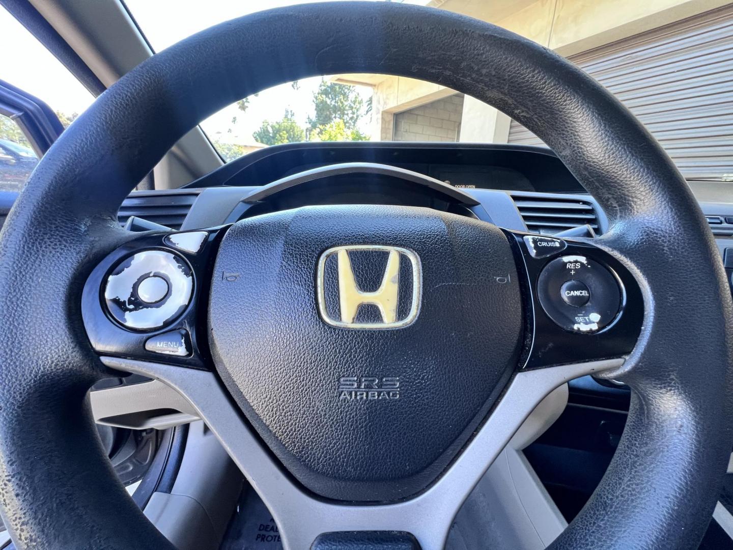 2012 Urban Titanium Metallic /Tan Honda Civic LX Sedan 5-Speed AT (19XFB2F59CE) with an 1.8L L4 SOHC 16V engine, 5-Speed Automatic transmission, located at 30 S. Berkeley Avenue, Pasadena, CA, 91107, (626) 248-7567, 34.145447, -118.109398 - 2012 Honda Civic – Reliable Sedan with Buy Here Pay Here Financing in Pasadena, CA If you’re searching for a dependable, fuel-efficient, and affordable car that also qualifies for Buy Here Pay Here financing in Pasadena, this 2012 Honda Civic is an excellent choice. Known for its long-lasting - Photo#23