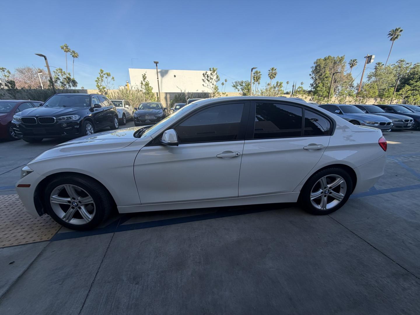 2013 White /Black BMW 3-Series 328i Sedan (WBA3C1C56DK) with an 2.0L L4 DOHC 16V engine, Automatic transmission, located at 30 S. Berkeley Avenue, Pasadena, CA, 91107, (626) 248-7567, 34.145447, -118.109398 - Looking for a sleek and stylish sedan that won't break the bank? Look no further than this 2013 BMW 3-Series 328i Sedan. With its classic design and top-of-the-line features, this car is sure to turn heads on the road. And with our buy here pay here financing options, you can drive away with the car - Photo#1