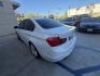 2013 White /Black BMW 3-Series 328i Sedan (WBA3C1C56DK) with an 2.0L L4 DOHC 16V engine, Automatic transmission, located at 30 S. Berkeley Avenue, Pasadena, CA, 91107, (626) 248-7567, 34.145447, -118.109398 - Looking for a sleek and stylish sedan that won't break the bank? Look no further than this 2013 BMW 3-Series 328i Sedan. With its classic design and top-of-the-line features, this car is sure to turn heads on the road. And with our buy here pay here financing options, you can drive away with the car - Photo#2