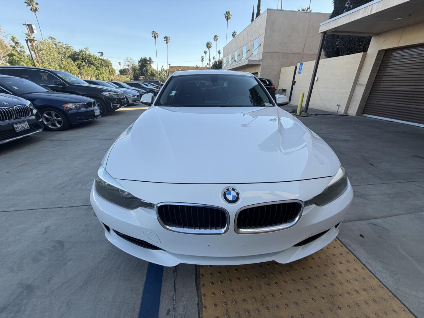 2013 White /Black BMW 3-Series 328i Sedan (WBA3C1C56DK) with an 2.0L L4 DOHC 16V engine, Automatic transmission, located at 30 S. Berkeley Avenue, Pasadena, CA, 91107, (626) 248-7567, 34.145447, -118.109398 - Looking for a sleek and stylish sedan that won't break the bank? Look no further than this 2013 BMW 3-Series 328i Sedan. With its classic design and top-of-the-line features, this car is sure to turn heads on the road. And with our buy here pay here financing options, you can drive away with the car - Photo#5
