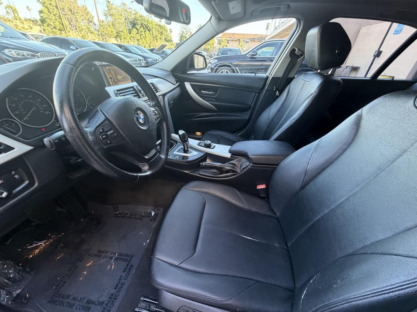 2013 White /Black BMW 3-Series 328i Sedan (WBA3C1C56DK) with an 2.0L L4 DOHC 16V engine, Automatic transmission, located at 30 S. Berkeley Avenue, Pasadena, CA, 91107, (626) 248-7567, 34.145447, -118.109398 - Looking for a sleek and stylish sedan that won't break the bank? Look no further than this 2013 BMW 3-Series 328i Sedan. With its classic design and top-of-the-line features, this car is sure to turn heads on the road. And with our buy here pay here financing options, you can drive away with the car - Photo#4