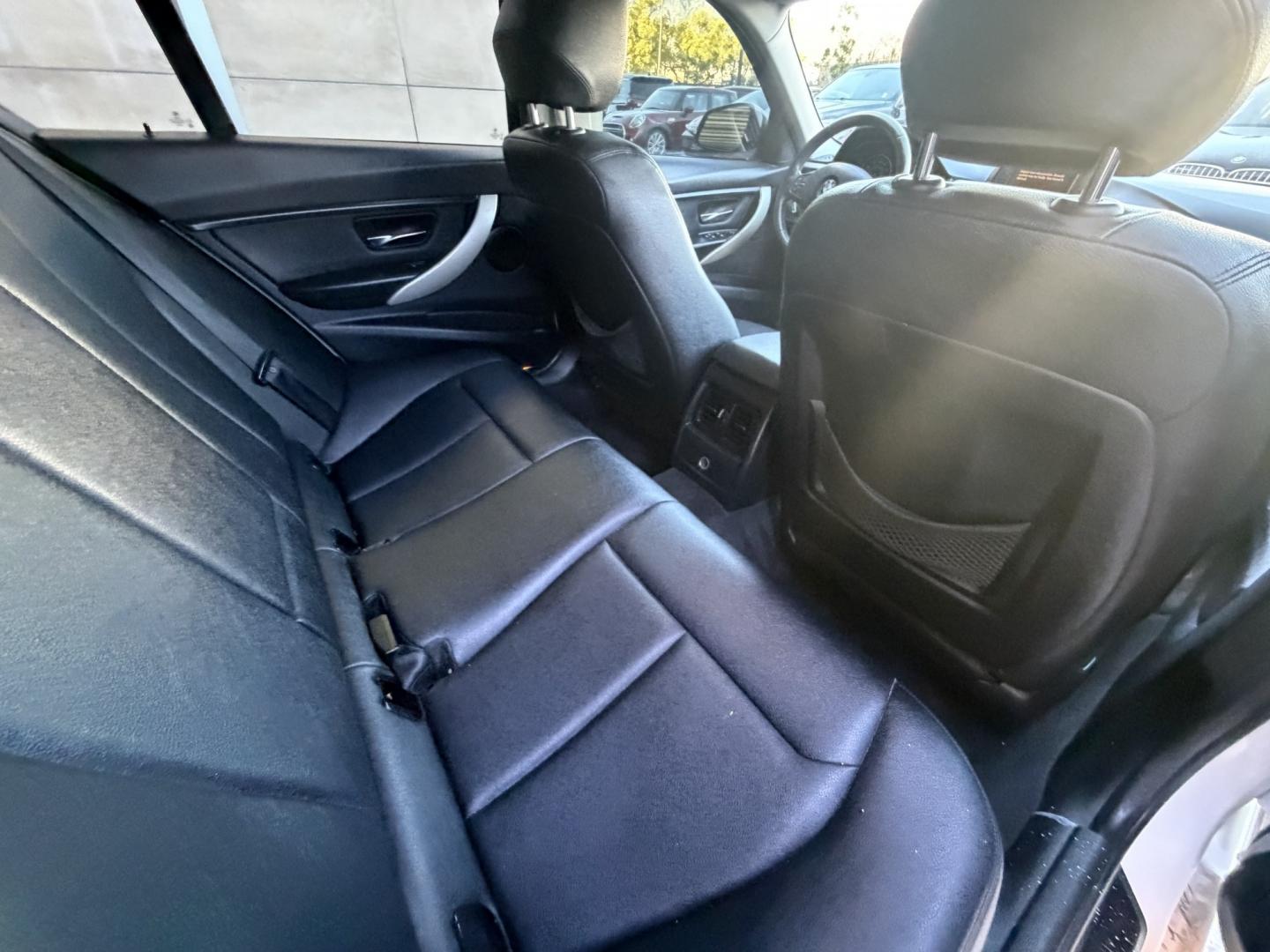 2013 White /Black BMW 3-Series 328i Sedan (WBA3C1C56DK) with an 2.0L L4 DOHC 16V engine, Automatic transmission, located at 30 S. Berkeley Avenue, Pasadena, CA, 91107, (626) 248-7567, 34.145447, -118.109398 - Looking for a sleek and stylish sedan that won't break the bank? Look no further than this 2013 BMW 3-Series 328i Sedan. With its classic design and top-of-the-line features, this car is sure to turn heads on the road. And with our buy here pay here financing options, you can drive away with the car - Photo#10