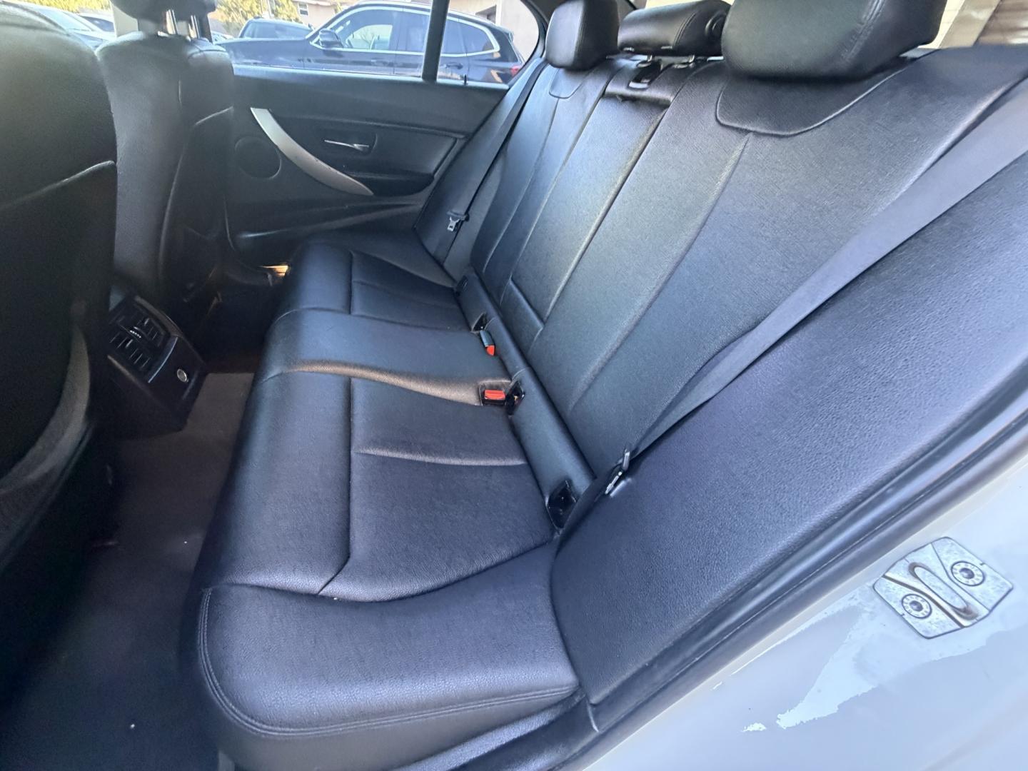 2013 White /Black BMW 3-Series 328i Sedan (WBA3C1C56DK) with an 2.0L L4 DOHC 16V engine, Automatic transmission, located at 30 S. Berkeley Avenue, Pasadena, CA, 91107, (626) 248-7567, 34.145447, -118.109398 - Looking for a sleek and stylish sedan that won't break the bank? Look no further than this 2013 BMW 3-Series 328i Sedan. With its classic design and top-of-the-line features, this car is sure to turn heads on the road. And with our buy here pay here financing options, you can drive away with the car - Photo#14