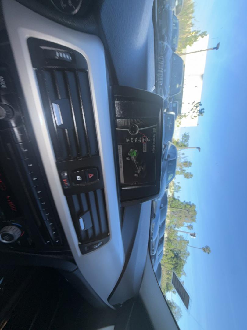 2013 White /Black BMW 3-Series 328i Sedan (WBA3C1C56DK) with an 2.0L L4 DOHC 16V engine, Automatic transmission, located at 30 S. Berkeley Avenue, Pasadena, CA, 91107, (626) 248-7567, 34.145447, -118.109398 - Looking for a sleek and stylish sedan that won't break the bank? Look no further than this 2013 BMW 3-Series 328i Sedan. With its classic design and top-of-the-line features, this car is sure to turn heads on the road. And with our buy here pay here financing options, you can drive away with the car - Photo#18