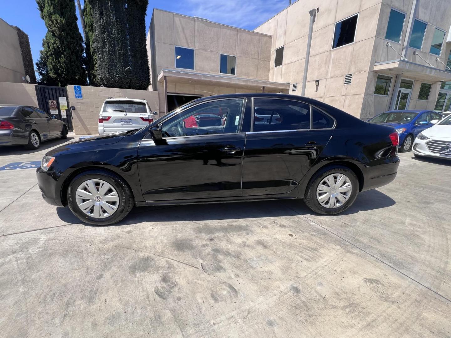 2013 Black /Black Volkswagen Jetta S (3VW2K7AJXDM) with an 2.0L L4 DOHC 20V engine, Automatic transmission, located at 30 S. Berkeley Avenue, Pasadena, CA, 91107, (626) 248-7567, 34.145447, -118.109398 - 2013 Volkswagen Jetta S – Buy Here Pay Here – Easy Financing in Pasadena, CA Looking for a reliable, stylish, and fuel-efficient sedan that won’t break the bank? This 2013 Volkswagen Jetta S is the perfect choice for drivers in Pasadena and the surrounding Los Angeles area who want dependable - Photo#1