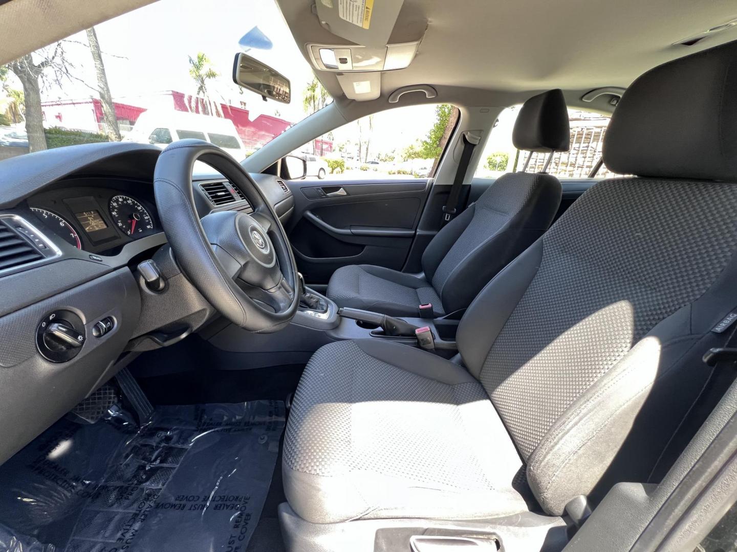 2013 Black /Black Volkswagen Jetta S (3VW2K7AJXDM) with an 2.0L L4 DOHC 20V engine, Automatic transmission, located at 30 S. Berkeley Avenue, Pasadena, CA, 91107, (626) 248-7567, 34.145447, -118.109398 - 2013 Volkswagen Jetta S – Buy Here Pay Here – Easy Financing in Pasadena, CA Looking for a reliable, stylish, and fuel-efficient sedan that won’t break the bank? This 2013 Volkswagen Jetta S is the perfect choice for drivers in Pasadena and the surrounding Los Angeles area who want dependable - Photo#6