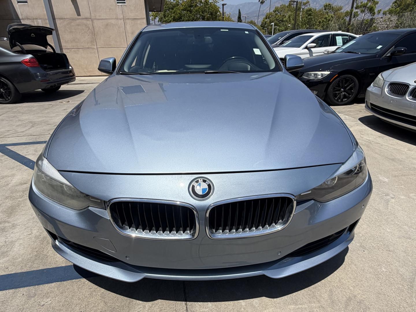 2013 BLUE /black leather BMW 3-Series 328i Sedan (WBA3A5C58DF) with an 2.0L L4 DOHC 16V engine, 8-Speed Automatic transmission, located at 30 S. Berkeley Avenue, Pasadena, CA, 91107, (626) 248-7567, 34.145447, -118.109398 - Looking for a luxurious and high-performing car that comes loaded with all the latest features? Look no further than the 2013 BMW 3-Series 328i Sedan, available at Crown City Motors. This stunning sedan is not only a head-turner on the road, but it also comes with all the latest features that you co - Photo#13