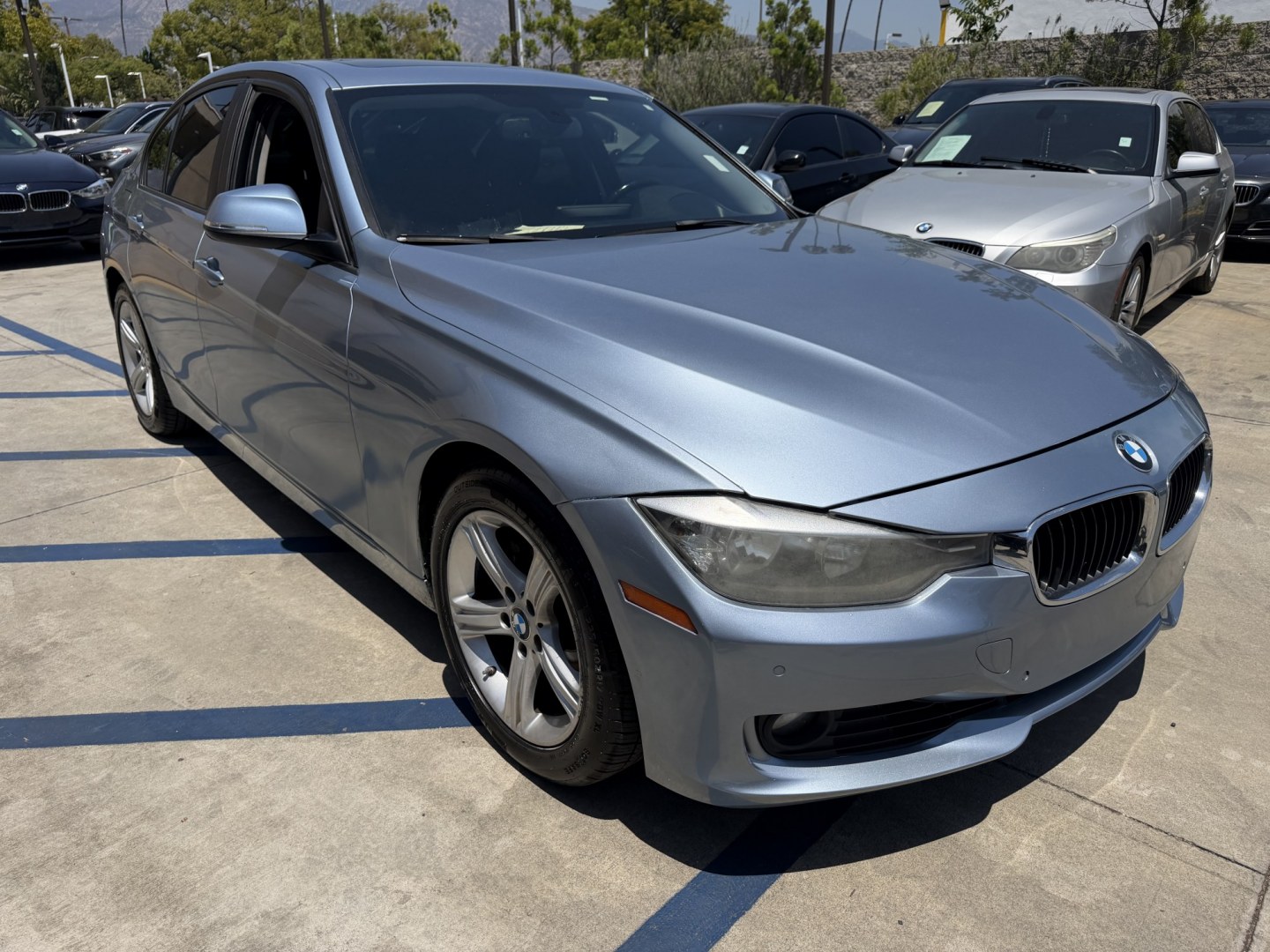 2013 BLUE /black leather BMW 3-Series 328i Sedan (WBA3A5C58DF) with an 2.0L L4 DOHC 16V engine, 8-Speed Automatic transmission, located at 30 S. Berkeley Avenue, Pasadena, CA, 91107, (626) 248-7567, 34.145447, -118.109398 - Looking for a luxurious and high-performing car that comes loaded with all the latest features? Look no further than the 2013 BMW 3-Series 328i Sedan, available at Crown City Motors. This stunning sedan is not only a head-turner on the road, but it also comes with all the latest features that you co - Photo#14