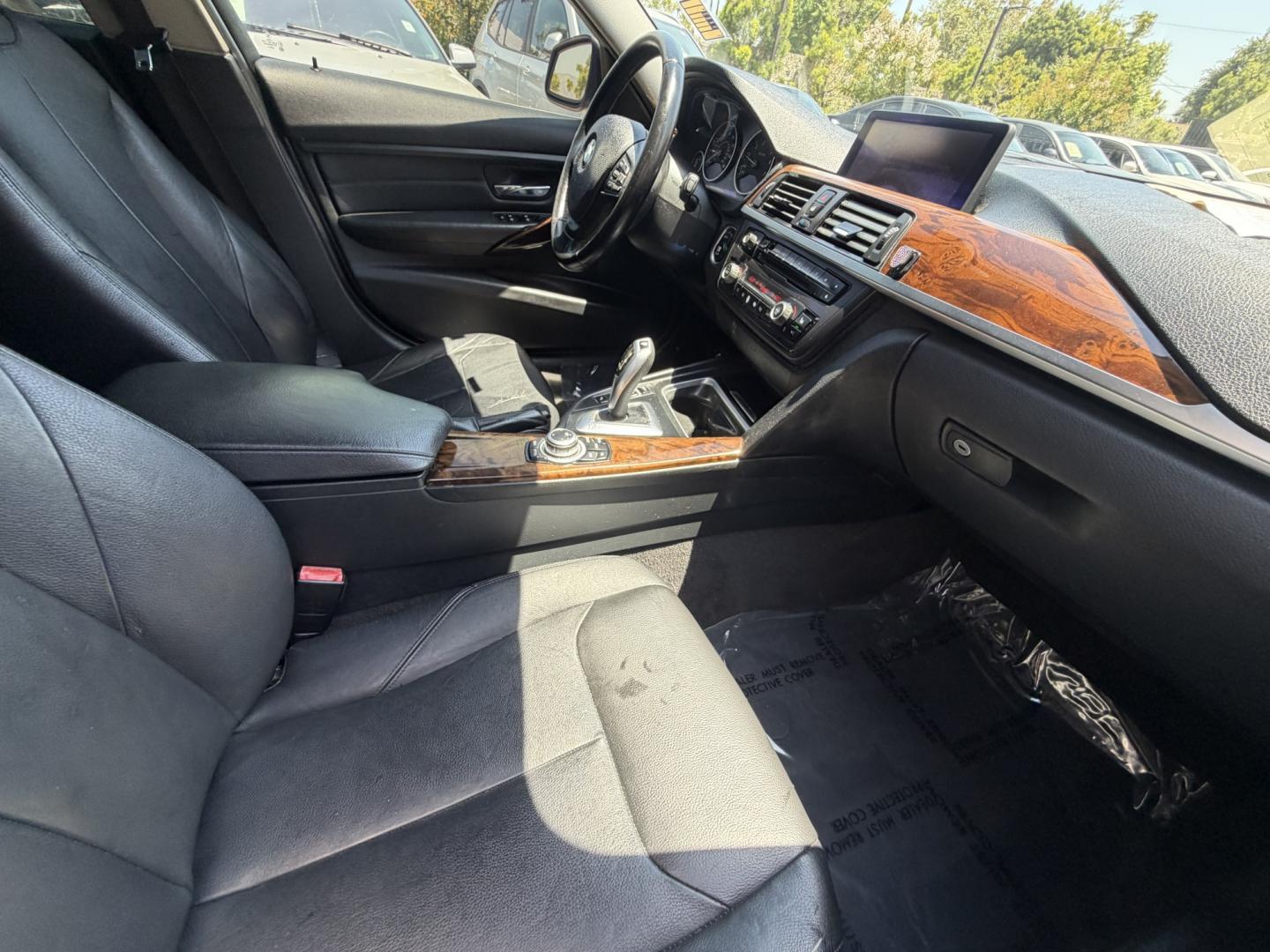2013 BLUE /black leather BMW 3-Series 328i Sedan (WBA3A5C58DF) with an 2.0L L4 DOHC 16V engine, 8-Speed Automatic transmission, located at 30 S. Berkeley Avenue, Pasadena, CA, 91107, (626) 248-7567, 34.145447, -118.109398 - Looking for a luxurious and high-performing car that comes loaded with all the latest features? Look no further than the 2013 BMW 3-Series 328i Sedan, available at Crown City Motors. This stunning sedan is not only a head-turner on the road, but it also comes with all the latest features that you co - Photo#19