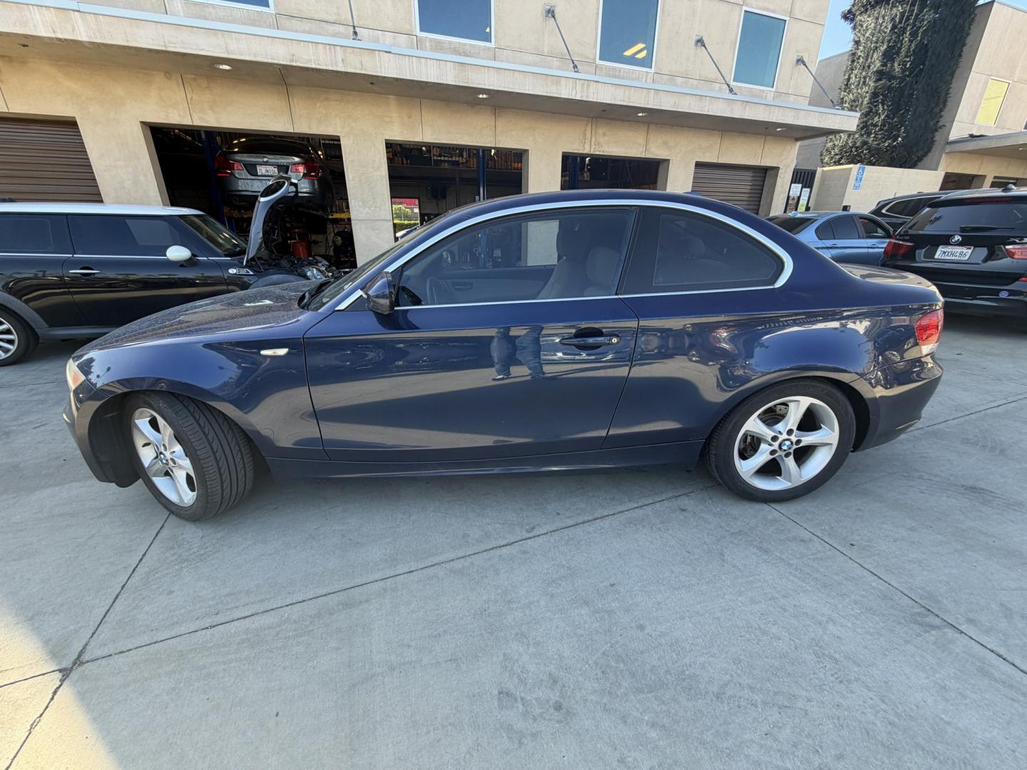 2011 BLUE /tan BMW 1-Series 128i Coupe (WBAUP7C50BV) with an 3.0L L6 DOHC 24V engine, 5-Speed Automatic transmission, located at 30 S. Berkeley Avenue, Pasadena, CA, 91107, (626) 248-7567, 34.145447, -118.109398 - 2011 BMW 128i Coupe – Luxury, Performance & Easy Financing in Pasadena! Looking for a sporty luxury car with powerful performance and smooth handling? This 2011 BMW 128i Coupe delivers classic BMW driving dynamics with a reliable 3.0L inline-6 engine and rear-wheel drive performance. Finishe - Photo#1