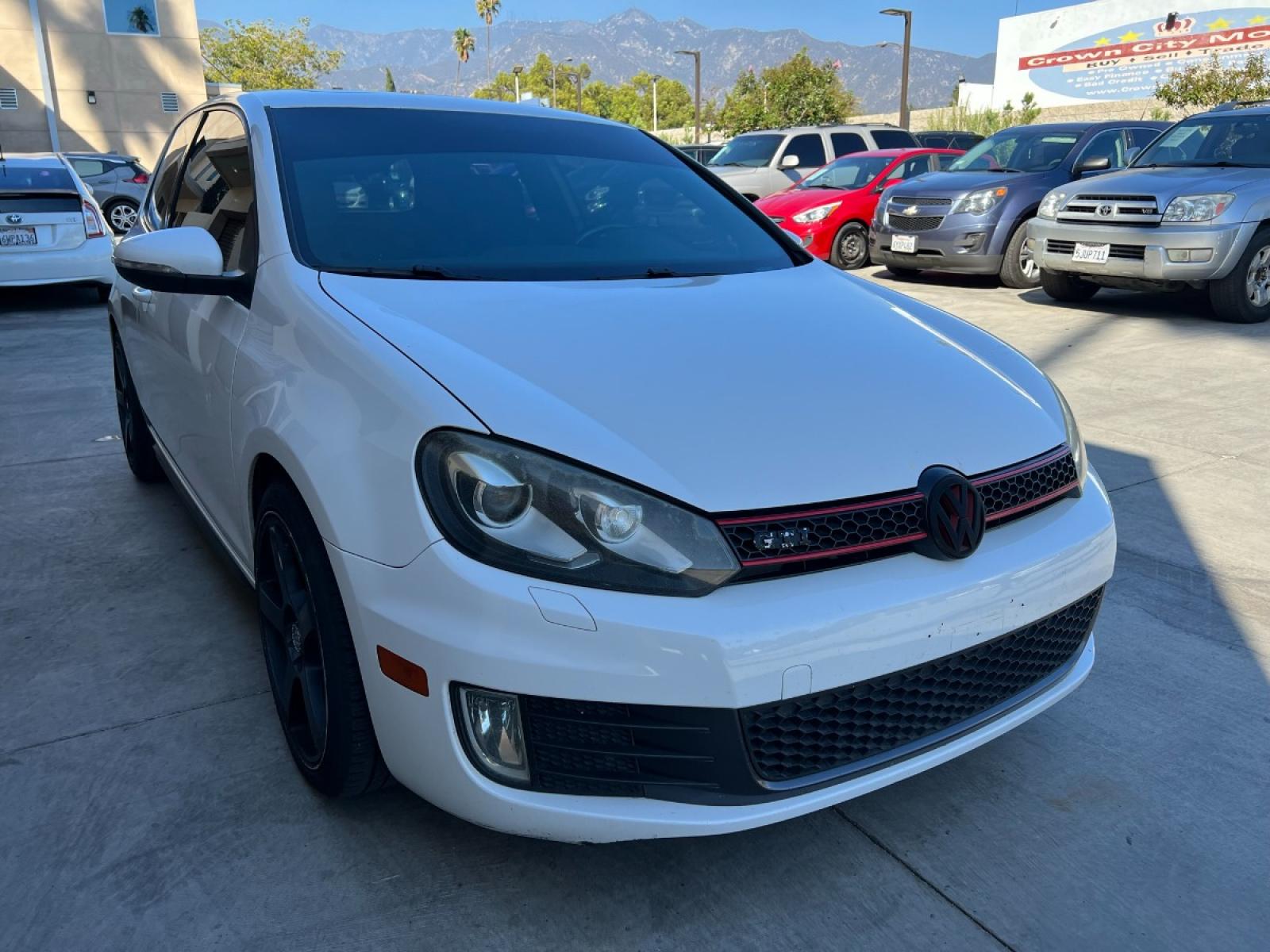 2010 White /Black Volkswagen GTI 2.0T Coupe PZEV (WVWFD7AJ9AW) with an 2.0L L4 DOHC 16V TURBO engine, Automatic transmission, located at 30 S. Berkeley Avenue, Pasadena, CA, 91107, (626) 248-7567, 34.145447, -118.109398 - Leather Seats! Moon-roof! This 2010 Volkswagen GTI 2.0T Coupe PZEV looks and drives well. - Photo #2