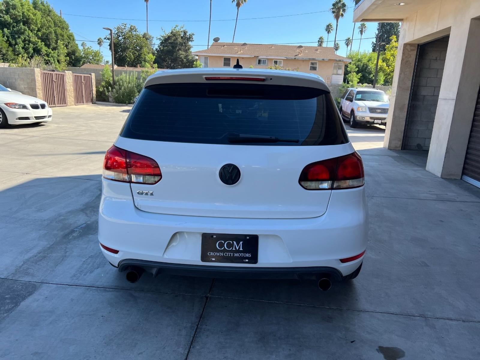 2010 White /Black Volkswagen GTI 2.0T Coupe PZEV (WVWFD7AJ9AW) with an 2.0L L4 DOHC 16V TURBO engine, Automatic transmission, located at 30 S. Berkeley Avenue, Pasadena, CA, 91107, (626) 248-7567, 34.145447, -118.109398 - Leather Seats! Moon-roof! This 2010 Volkswagen GTI 2.0T Coupe PZEV looks and drives well. - Photo #4