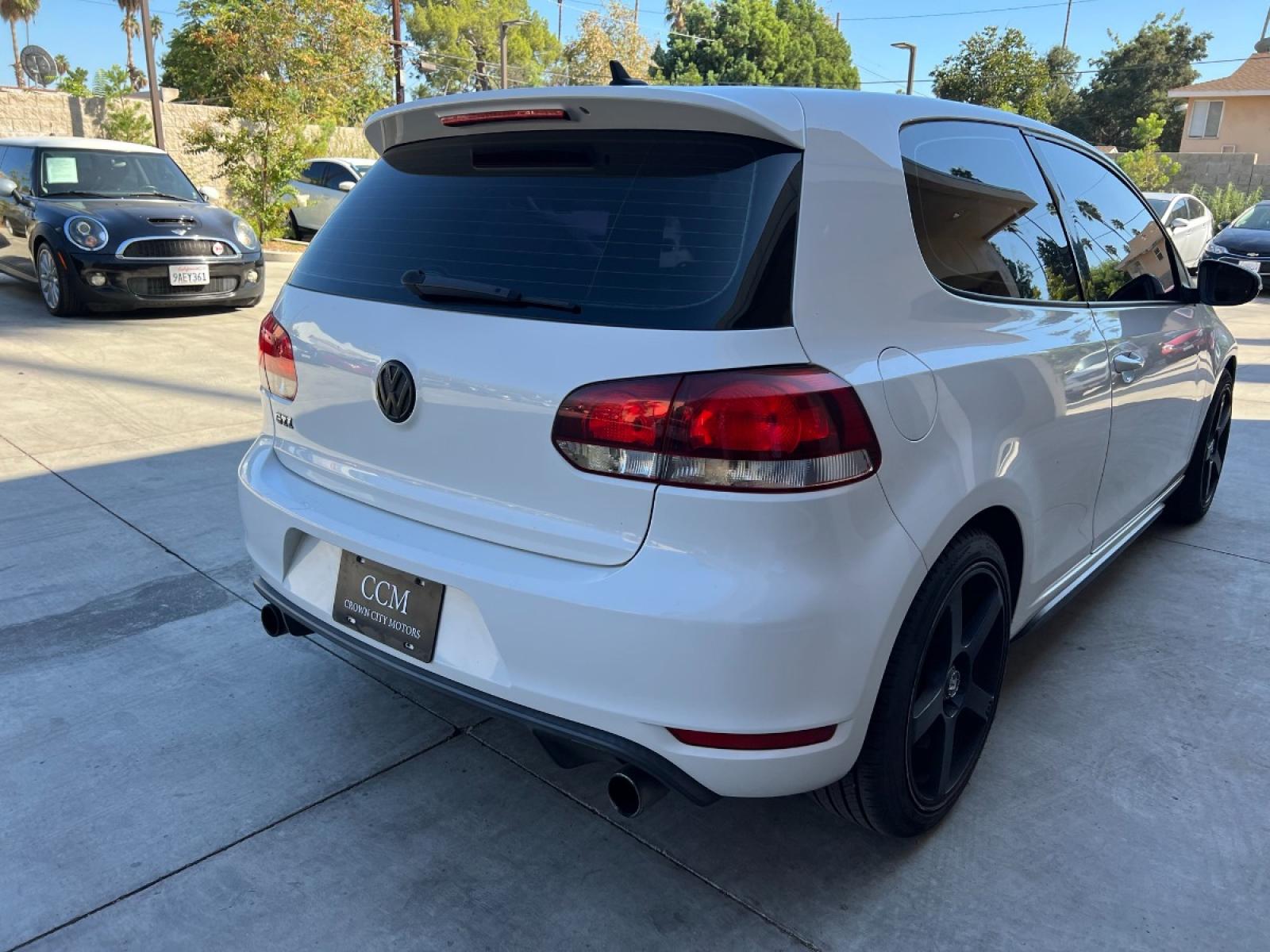2010 White /Black Volkswagen GTI 2.0T Coupe PZEV (WVWFD7AJ9AW) with an 2.0L L4 DOHC 16V TURBO engine, Automatic transmission, located at 30 S. Berkeley Avenue, Pasadena, CA, 91107, (626) 248-7567, 34.145447, -118.109398 - Leather Seats! Moon-roof! This 2010 Volkswagen GTI 2.0T Coupe PZEV looks and drives well. - Photo #5