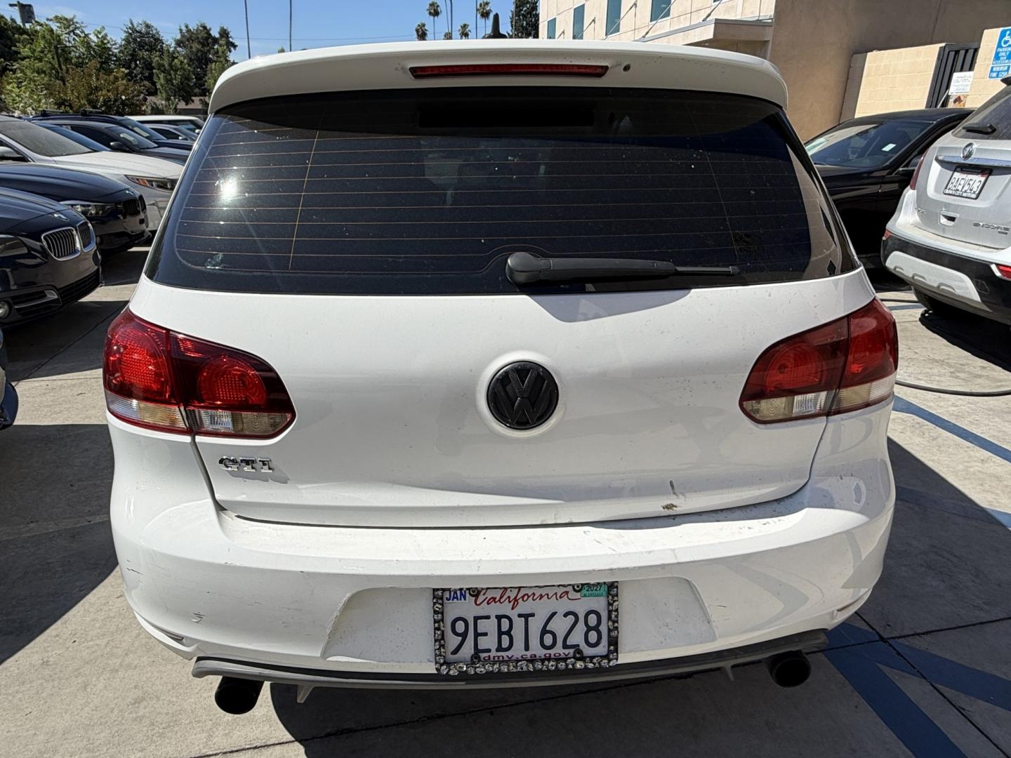2010 White /Black Volkswagen GTI 2.0T Coupe PZEV (WVWFD7AJ9AW) with an 2.0L L4 DOHC 16V TURBO engine, Automatic transmission, located at 30 S. Berkeley Avenue, Pasadena, CA, 91107, (626) 248-7567, 34.145447, -118.109398 - Decoding VIN WVWFD7AJ9AW167549: Vehicle: 2010 Volkswagen Jetta SportWagen (2.5L 5-Cylinder) Country of Origin: Built in Germany (WVW manufacturer code) Body Style: 4-Door Station Wagon / SportWagen This is a great unit for your lot. European wagons like this 2.5L Jetta SportWagen hit tha- Photo#3
