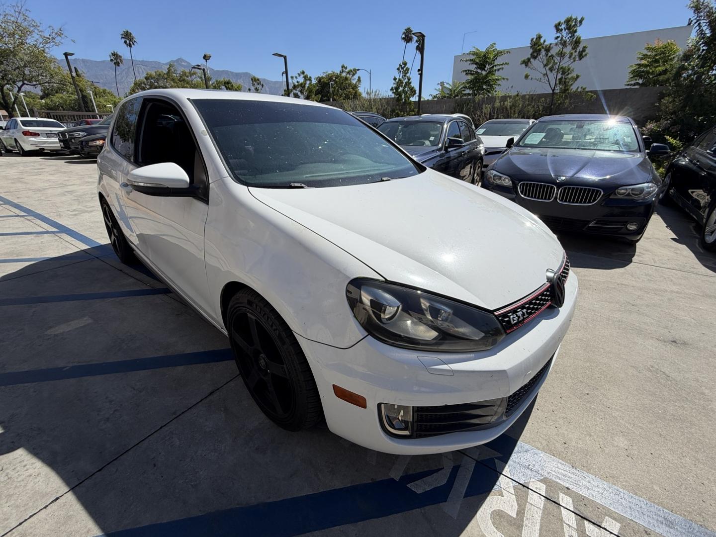 2010 White /Black Volkswagen GTI 2.0T Coupe PZEV (WVWFD7AJ9AW) with an 2.0L L4 DOHC 16V TURBO engine, Automatic transmission, located at 30 S. Berkeley Avenue, Pasadena, CA, 91107, (626) 248-7567, 34.145447, -118.109398 - Decoding VIN WVWFD7AJ9AW167549: Vehicle: 2010 Volkswagen Jetta SportWagen (2.5L 5-Cylinder) Country of Origin: Built in Germany (WVW manufacturer code) Body Style: 4-Door Station Wagon / SportWagen This is a great unit for your lot. European wagons like this 2.5L Jetta SportWagen hit tha- Photo#5