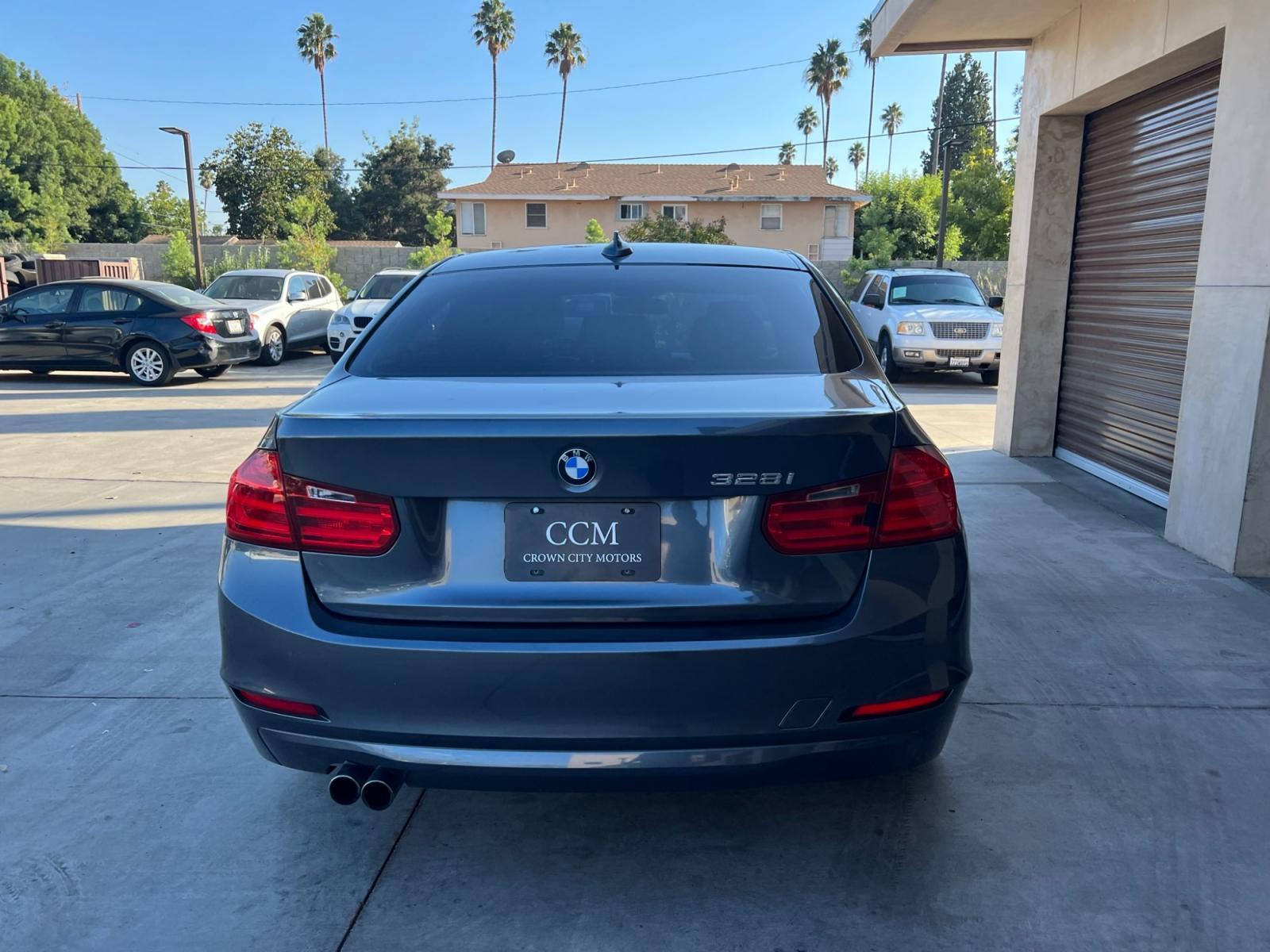 2013 /Black BMW 3-Series 328i Sedan (WBA3C1C51DF) with an 2.0L L4 DOHC 16V engine, Automatic transmission, located at 30 S. Berkeley Avenue, Pasadena, CA, 91107, (626) 248-7567, 34.145447, -118.109398 - Moon-Roof! Premium Wheels! Power seats! This 2013 BMW 3-Series 328i Sedan looks and drives well. - Photo #3