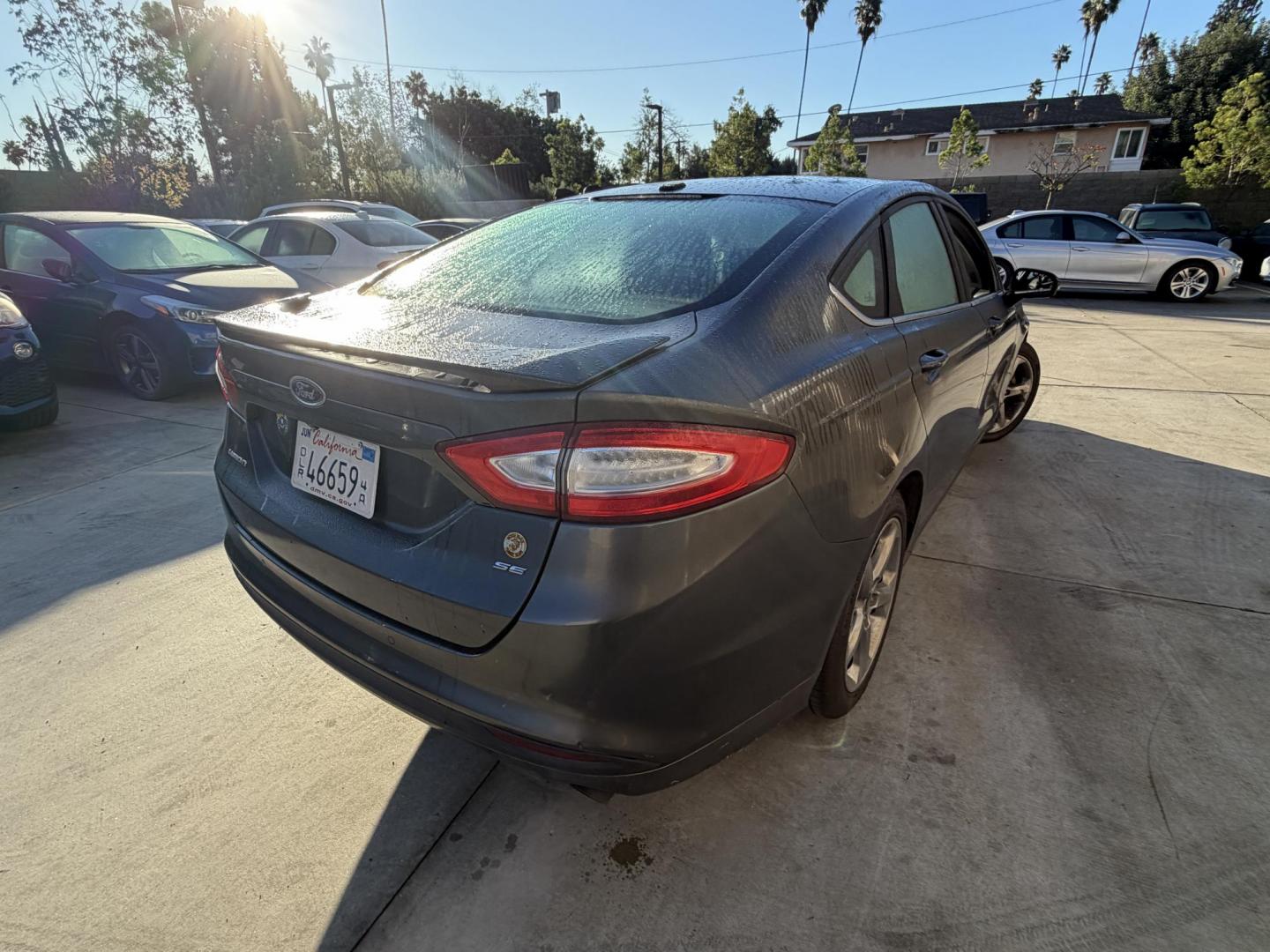 2015 /BLACK Ford Fusion SE (3FA6P0H75FR) with an 2.5L L4 DOHC 16V engine, located at 30 S. Berkeley Avenue, Pasadena, CA, 91107, (626) 248-7567, 34.145447, -118.109398 - Crown City Motors is a used “Buy Here Pay Here” car dealer in Pasadena CA. “Buy Here Pay Here” financing, means that when you purchase your vehicle from our dealership, that you make the payments to the dealership as well. We do not need the banks approval to get you approved for a used auto - Photo#1