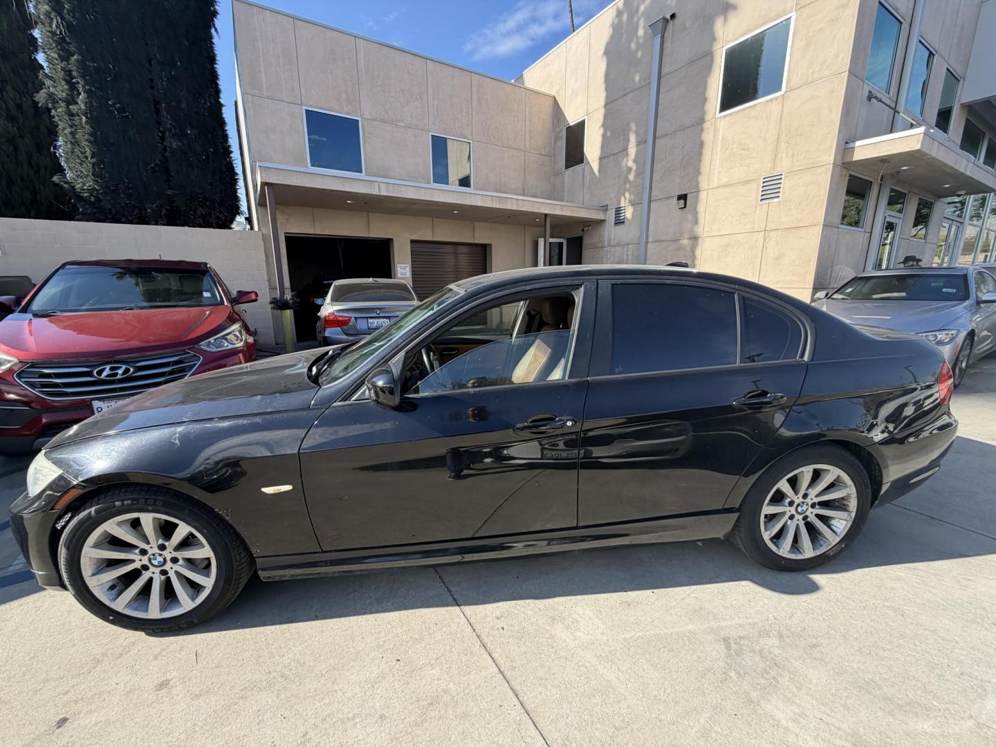 2011 BLACK /Peanut Interior BMW 3-Series 328i xDrive SA (WBAPK5G56BN) with an 3.0L L6 DOHC 24V engine, automatic transmission, located at 30 S. Berkeley Avenue, Pasadena, CA, 91107, (626) 248-7567, 34.145447, -118.109398 - Leather! Moon-roof! Premium Wheels! This 2011 BMW 3-Series 328i xDrive SA looks and drives well. Crown City Motors is a used “Buy Here Pay Here” car dealer in Pasadena CA. “Buy Here Pay Here” financing, means that when you purchase your vehicle from our dealership, that you make the payment - Photo#1