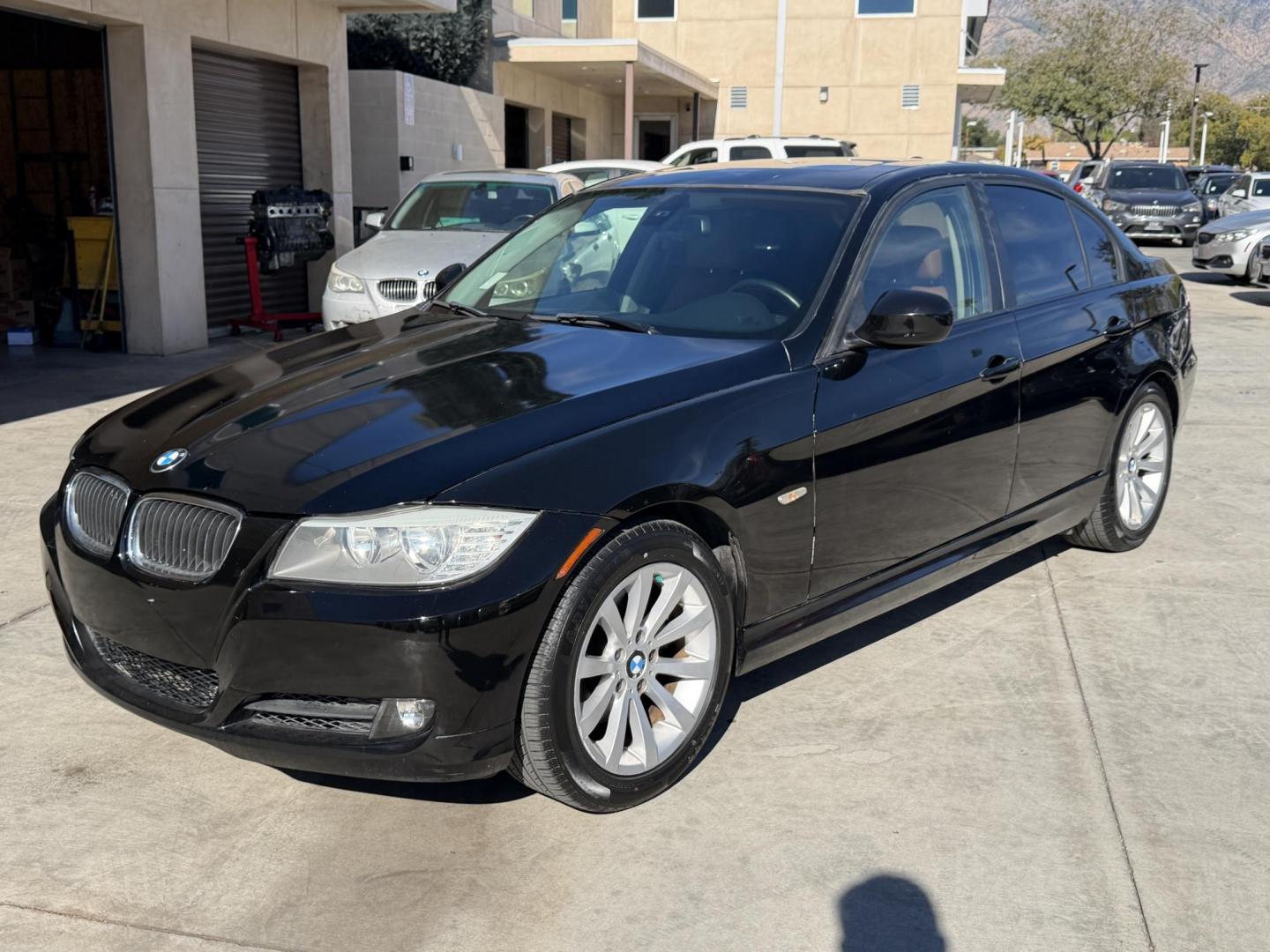 2011 BLACK /Peanut Interior BMW 3-Series 328i xDrive SA (WBAPK5G56BN) with an 3.0L L6 DOHC 24V engine, automatic transmission, located at 30 S. Berkeley Avenue, Pasadena, CA, 91107, (626) 248-7567, 34.145447, -118.109398 - Leather! Moon-roof! Premium Wheels! This 2011 BMW 3-Series 328i xDrive SA looks and drives well. Crown City Motors is a used “Buy Here Pay Here” car dealer in Pasadena CA. “Buy Here Pay Here” financing, means that when you purchase your vehicle from our dealership, that you make the payment - Photo#3
