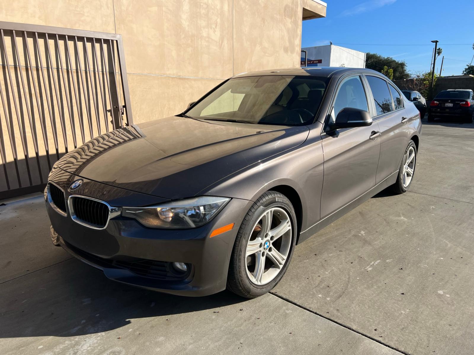 2013 Gray /Beige BMW 3-Series 328i Sedan (WBA3A5C52DF) with an 2.0L L4 DOHC 16V engine, automatic transmission, located at 30 S. Berkeley Avenue, Pasadena, CA, 91107, (626) 248-7567, 34.145447, -118.109398 - Low Miles! Leather Seats! Navigation! This 2013 BMW 3-Series 328i Sedan looks and drives well. - Photo #0