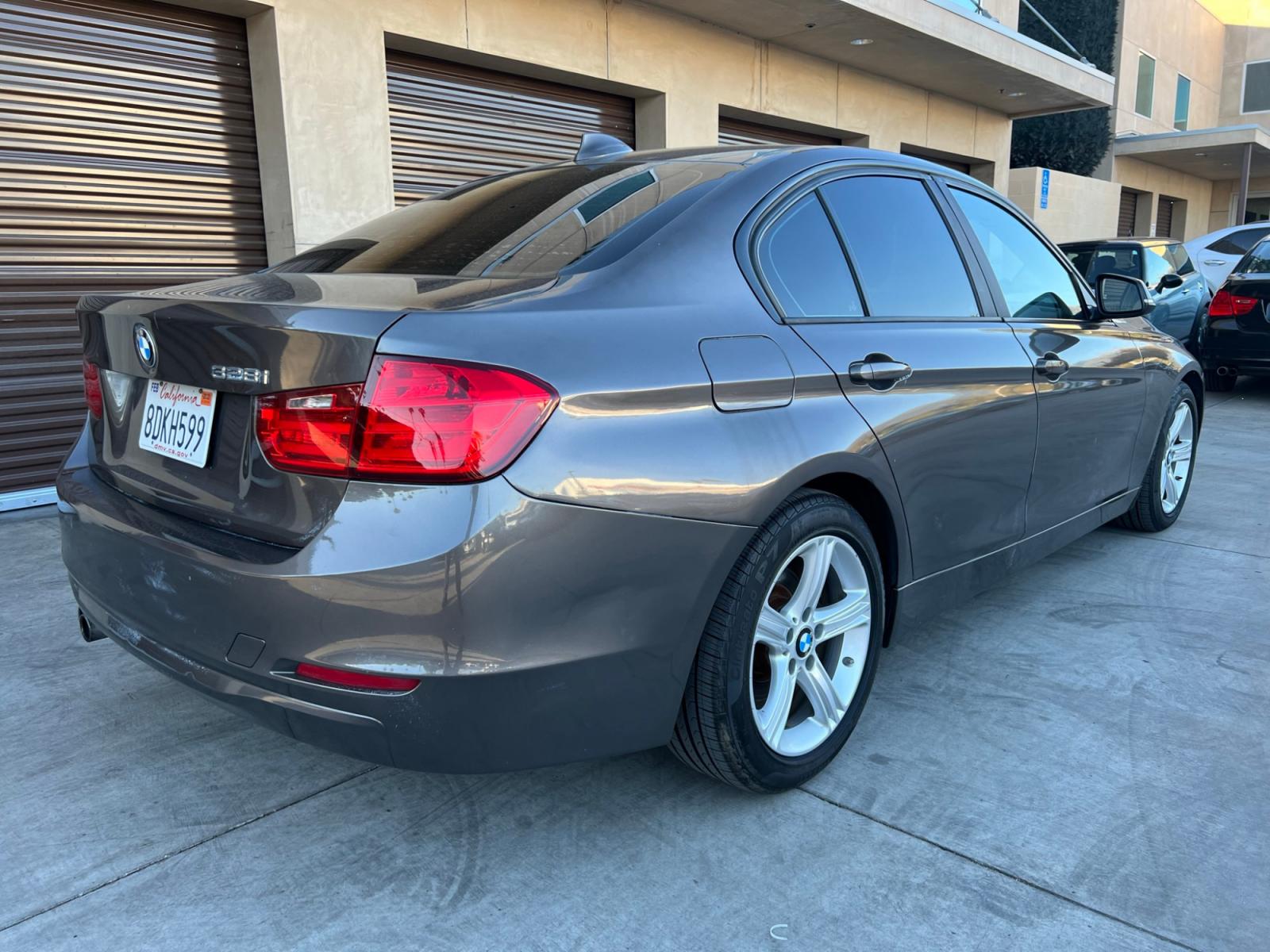 2013 Gray /Beige BMW 3-Series 328i Sedan (WBA3A5C52DF) with an 2.0L L4 DOHC 16V engine, automatic transmission, located at 30 S. Berkeley Avenue, Pasadena, CA, 91107, (626) 248-7567, 34.145447, -118.109398 - Low Miles! Leather Seats! Navigation! This 2013 BMW 3-Series 328i Sedan looks and drives well. - Photo #6