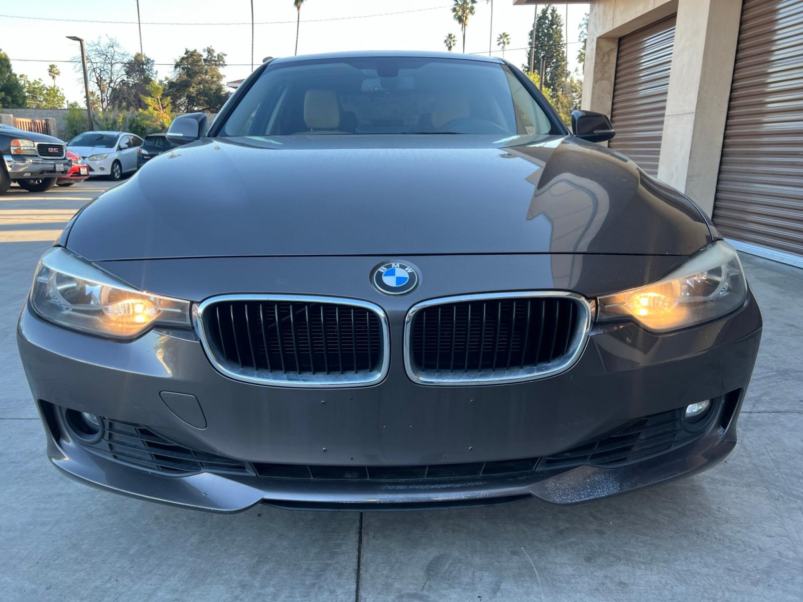 2013 Gray /Beige BMW 3-Series 328i Sedan (WBA3A5C52DF) with an 2.0L L4 DOHC 16V engine, automatic transmission, located at 30 S. Berkeley Avenue, Pasadena, CA, 91107, (626) 248-7567, 34.145447, -118.109398 - Low Miles! Leather Seats! Navigation! This 2013 BMW 3-Series 328i Sedan looks and drives well. - Photo #7