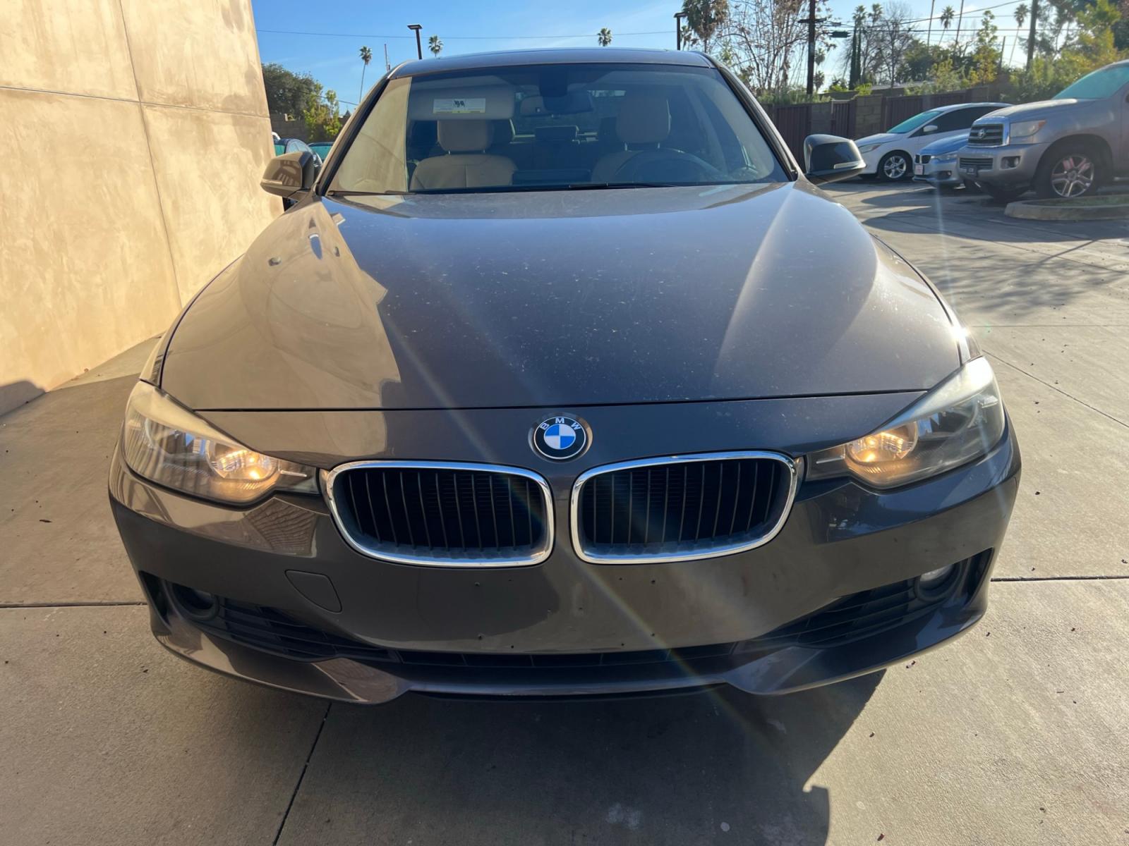 2013 Gray /Beige BMW 3-Series 328i Sedan (WBA3A5C52DF) with an 2.0L L4 DOHC 16V engine, automatic transmission, located at 30 S. Berkeley Avenue, Pasadena, CA, 91107, (626) 248-7567, 34.145447, -118.109398 - Low Miles! Leather Seats! Navigation! This 2013 BMW 3-Series 328i Sedan looks and drives well. - Photo #3