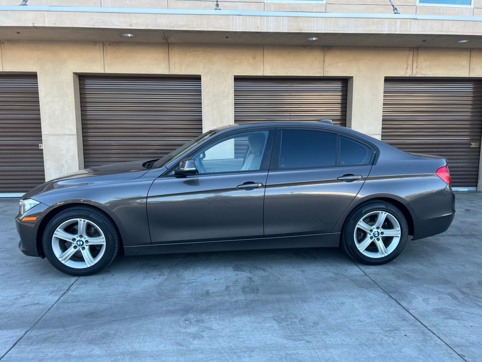 2013 Gray /Beige BMW 3-Series 328i Sedan (WBA3A5C52DF) with an 2.0L L4 DOHC 16V engine, automatic transmission, located at 30 S. Berkeley Avenue, Pasadena, CA, 91107, (626) 248-7567, 34.145447, -118.109398 - Low Miles! Leather Seats! Navigation! This 2013 BMW 3-Series 328i Sedan looks and drives well. - Photo #1