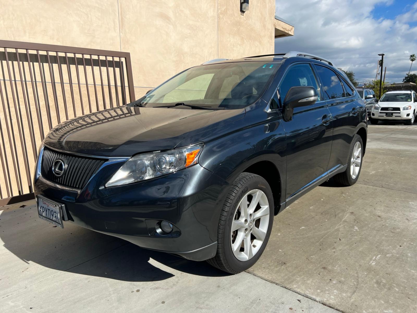 2011 /Black Lexus RX 350 FWD (2T2ZK1BA7BC) with an 3.5L V6 DOHC 24V engine, 5-Speed Automatic transmission, located at 30 S. Berkeley Avenue, Pasadena, CA, 91107, (626) 248-7567, 34.145447, -118.109398 - Leather! Navigation! Back-up Camera! This 2011 Lexus RX 350 FWD looks and drives well. Bad Credit? We can help! We are the bank. All our cars are thoroughly inspected and reconditioned by our technicians. FREE CARFAX report. Stop by or call to speak with our friendly staff. Whether you have bad cr - Photo #0
