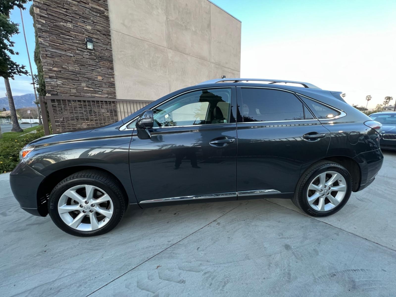2011 /Black Lexus RX 350 FWD (2T2ZK1BA7BC) with an 3.5L V6 DOHC 24V engine, 5-Speed Automatic transmission, located at 30 S. Berkeley Avenue, Pasadena, CA, 91107, (626) 248-7567, 34.145447, -118.109398 - Leather! Navigation! Back-up Camera! This 2011 Lexus RX 350 FWD looks and drives well. Bad Credit? We can help! We are the bank. All our cars are thoroughly inspected and reconditioned by our technicians. FREE CARFAX report. Stop by or call to speak with our friendly staff. Whether you have bad cr - Photo #1