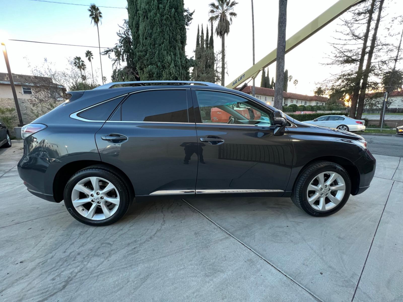 2011 /Black Lexus RX 350 FWD (2T2ZK1BA7BC) with an 3.5L V6 DOHC 24V engine, 5-Speed Automatic transmission, located at 30 S. Berkeley Avenue, Pasadena, CA, 91107, (626) 248-7567, 34.145447, -118.109398 - Leather! Navigation! Back-up Camera! This 2011 Lexus RX 350 FWD looks and drives well. Bad Credit? We can help! We are the bank. All our cars are thoroughly inspected and reconditioned by our technicians. FREE CARFAX report. Stop by or call to speak with our friendly staff. Whether you have bad cr - Photo #5