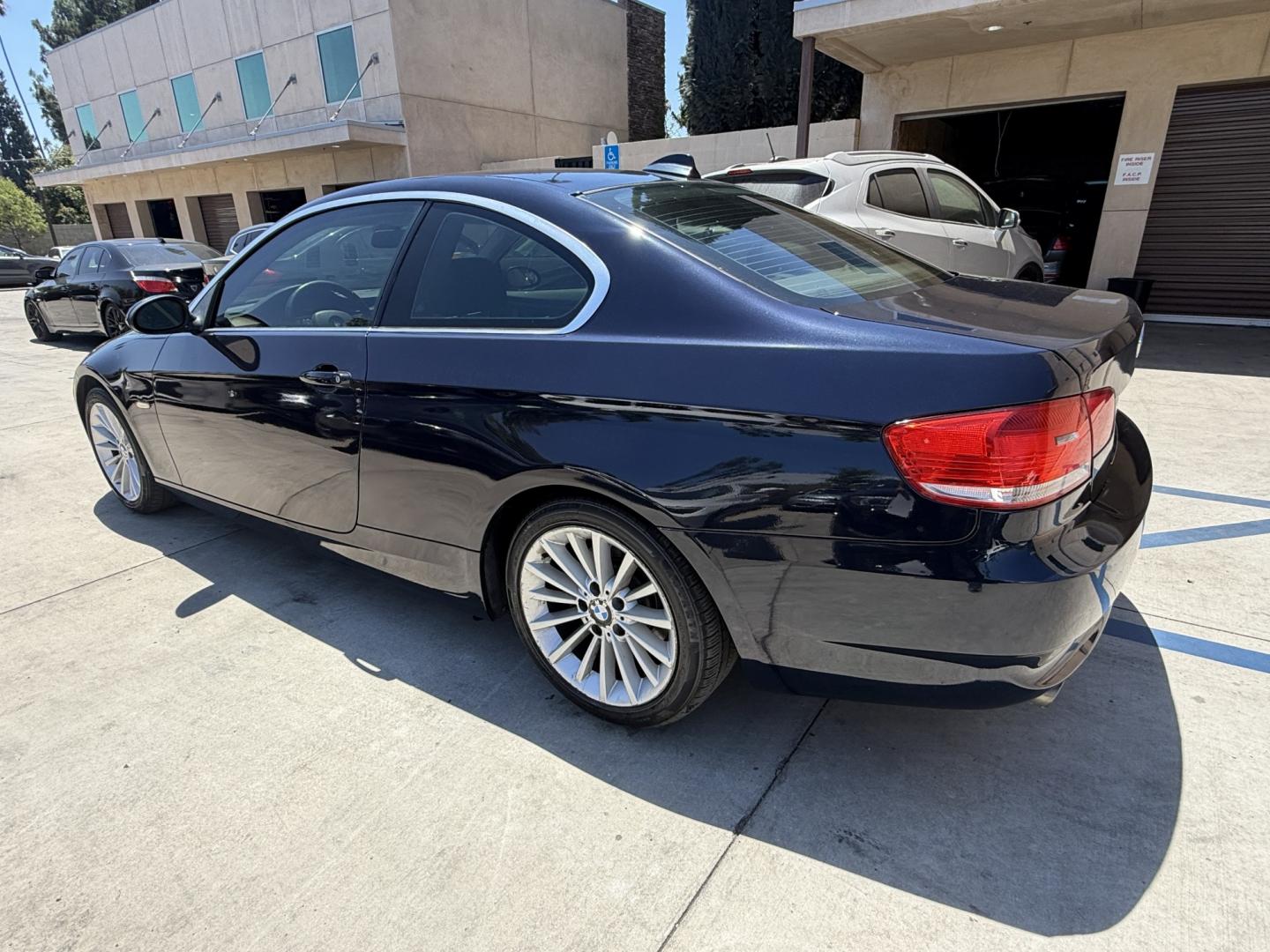 2009 BLACK /Gray BMW 3-Series 328xi Coupe (WBAWC33539P) with an 3.0L L6 DOHC 24V engine, Automatic transmission, located at 30 S. Berkeley Avenue, Pasadena, CA, 91107, (626) 248-7567, 34.145447, -118.109398 - Low Miles!! Leather Seats!!! X-DRIVE!! This 2009 BMW 3-Series 328xi Coupe looks and drives well. Bad Credit? We can help! We are the bank. All our cars are thoroughly inspected and reconditioned by our technicians. FREE CARFAX report. Stop by or call to speak with our friendly staff. Whether you h- Photo#3