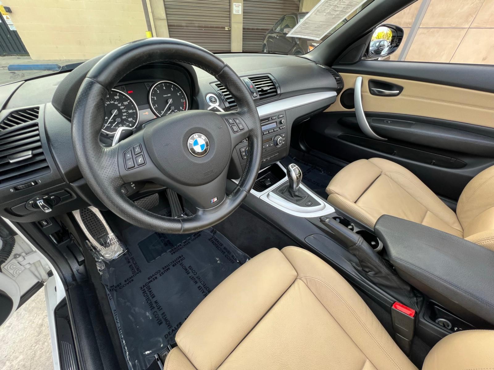 2012 White /Tan BMW 1-Series 135i Convertible (WBAUN7C5XCV) with an 3.0L L6 DOHC 24V engine, automatic transmission, located at 30 S. Berkeley Avenue, Pasadena, CA, 91107, (626) 248-7567, 34.145447, -118.109398 - Looking for a high-performance vehicle that is sure to turn heads on the road? The 2012 BMW 1-Series 135i Convertible is an excellent choice. With its M-Appearance package and luxurious leather seats, this convertible is designed to make a statement. Whether you're cruising down the highway or takin - Photo #16