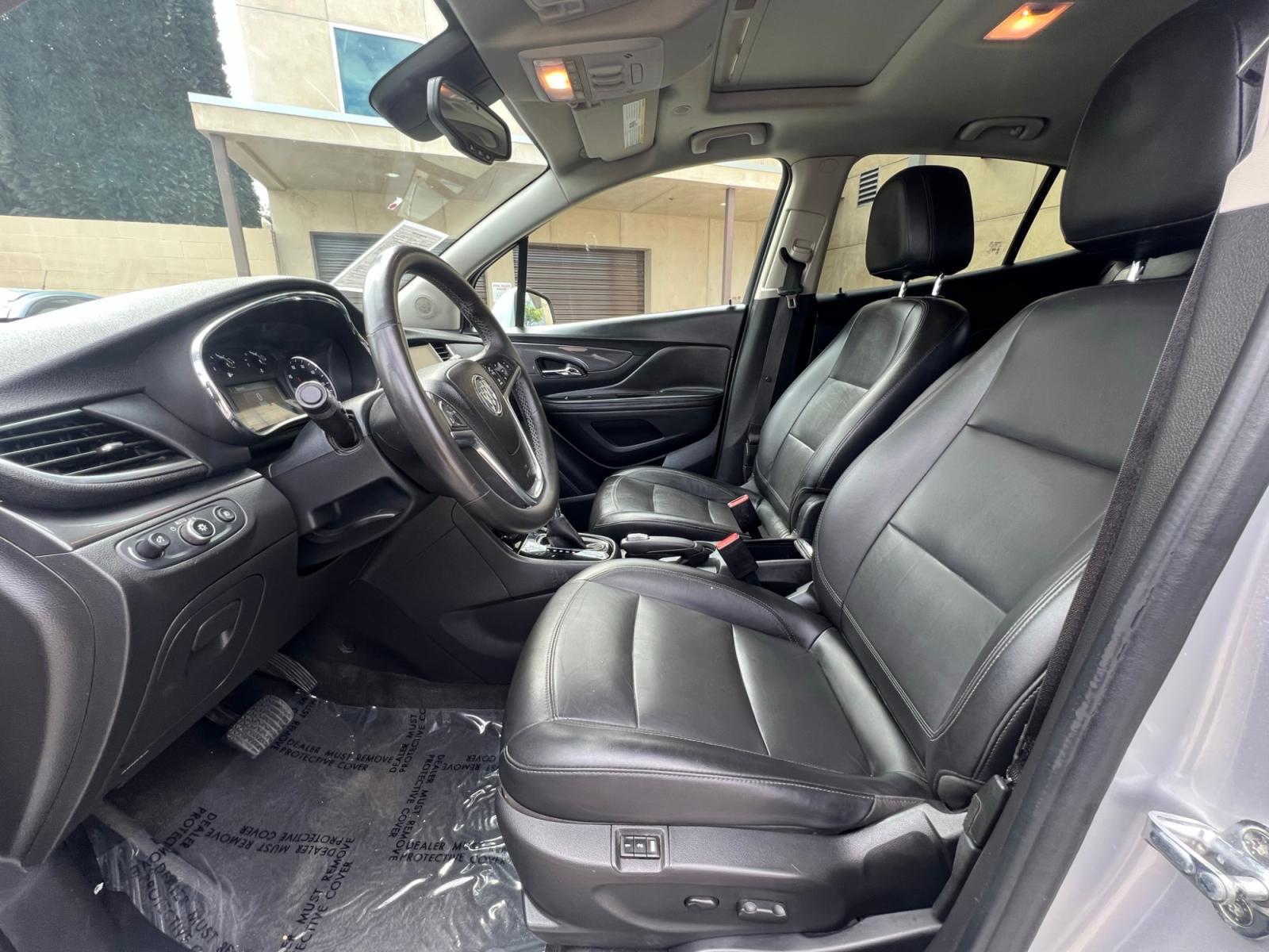 2018 Silver Buick Encore Essence AWD (KL4CJGSB7JB) with an 1.4L L4 DOHC 16V TURBO engine, 6A transmission, located at 30 S. Berkeley Avenue, Pasadena, CA, 91107, (626) 248-7567, 34.145447, -118.109398 - Crown City Motors is a used “Buy Here Pay Here” car dealer in Pasadena CA. “Buy Here Pay Here” financing, means that when you purchase your vehicle from our dealership, that you make the payments to the dealership as well. We do not need the banks approval to get you approved for a used auto - Photo #10