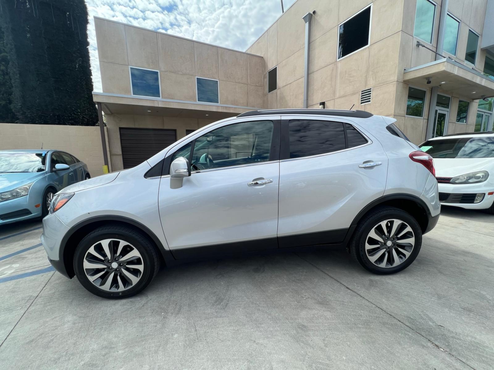 2018 Silver Buick Encore Essence AWD (KL4CJGSB7JB) with an 1.4L L4 DOHC 16V TURBO engine, 6A transmission, located at 30 S. Berkeley Avenue, Pasadena, CA, 91107, (626) 248-7567, 34.145447, -118.109398 - Crown City Motors is a used “Buy Here Pay Here” car dealer in Pasadena CA. “Buy Here Pay Here” financing, means that when you purchase your vehicle from our dealership, that you make the payments to the dealership as well. We do not need the banks approval to get you approved for a used auto - Photo #1