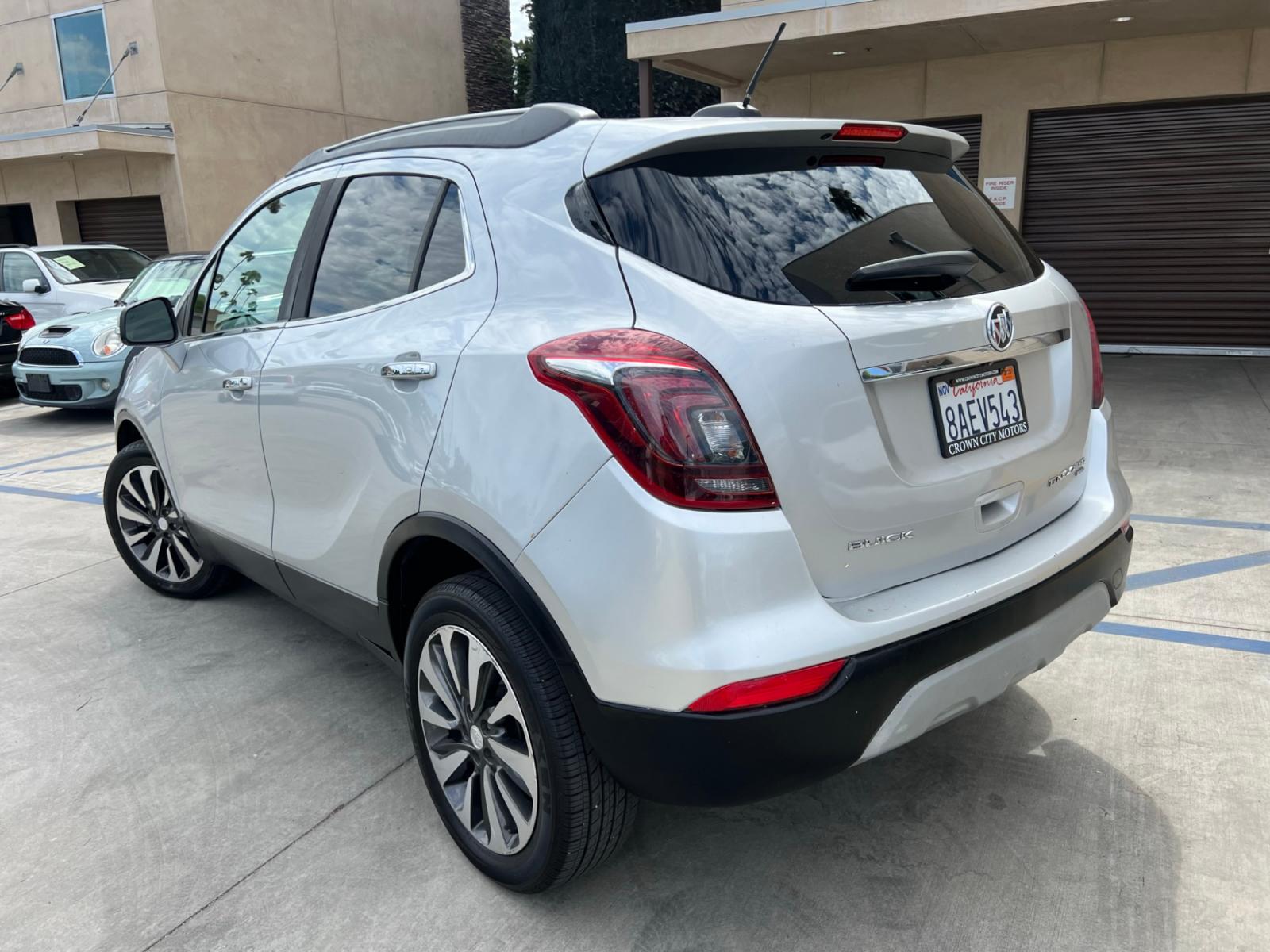 2018 Silver Buick Encore Essence AWD (KL4CJGSB7JB) with an 1.4L L4 DOHC 16V TURBO engine, 6A transmission, located at 30 S. Berkeley Avenue, Pasadena, CA, 91107, (626) 248-7567, 34.145447, -118.109398 - Crown City Motors is a used “Buy Here Pay Here” car dealer in Pasadena CA. “Buy Here Pay Here” financing, means that when you purchase your vehicle from our dealership, that you make the payments to the dealership as well. We do not need the banks approval to get you approved for a used auto - Photo #2