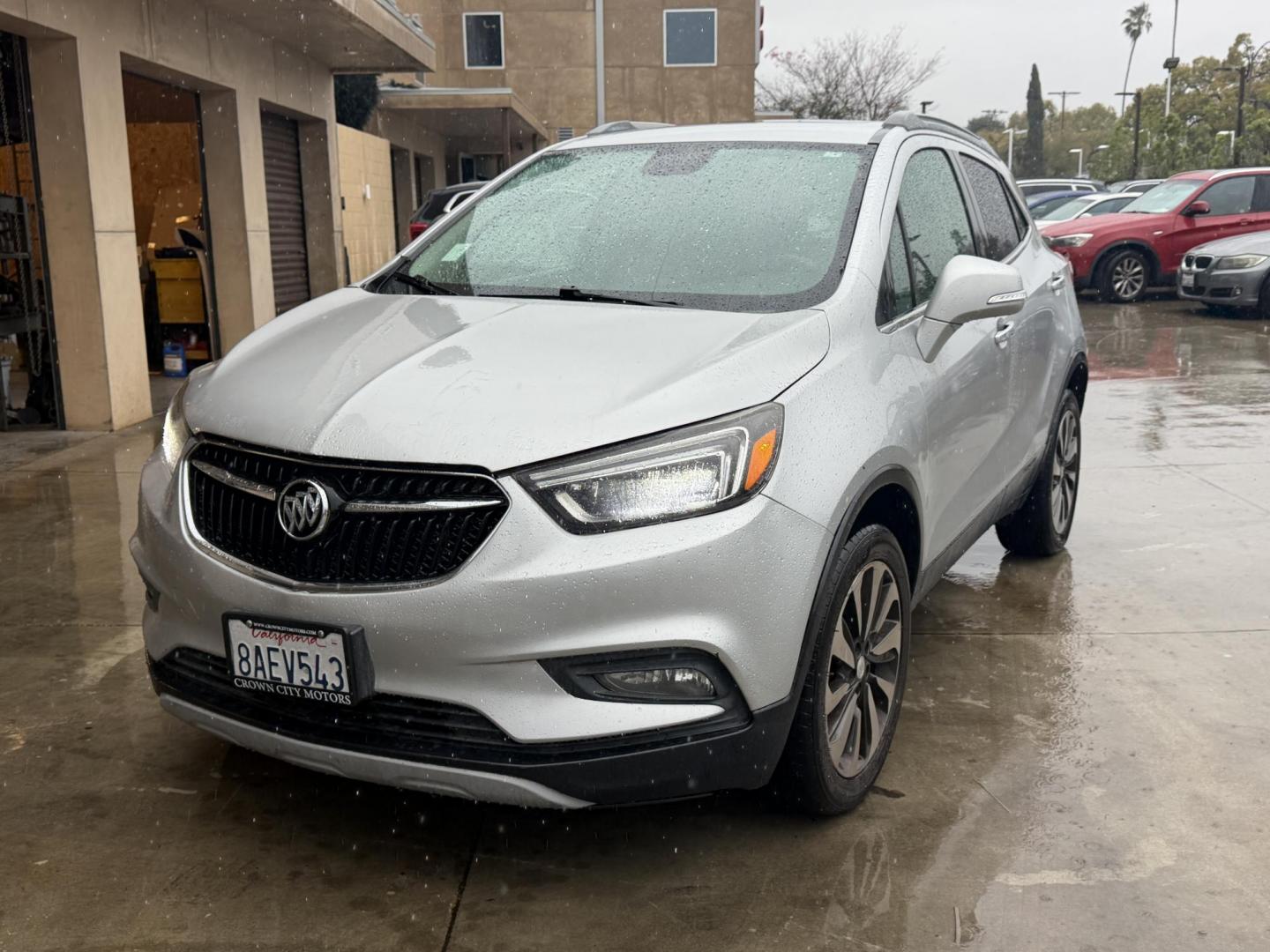 2018 Silver Buick Encore Essence AWD (KL4CJGSB7JB) with an 1.4L L4 DOHC 16V TURBO engine, 6A transmission, located at 30 S. Berkeley Avenue, Pasadena, CA, 91107, (626) 248-7567, 34.145447, -118.109398 - 2018 Buick Encore – Luxury Compact SUV – Easy Financing Available at Crown City Motors – Apply Online Today If you’re looking for a reliable, fuel-efficient, and luxury-inspired SUV with affordable Buy Here Pay Here financing, this 2018 Buick Encore is the perfect choice. At Crown City Mo - Photo#0