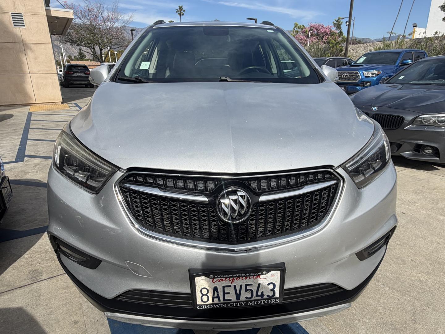 2018 Silver Buick Encore Essence AWD (KL4CJGSB7JB) with an 1.4L L4 DOHC 16V TURBO engine, 6A transmission, located at 30 S. Berkeley Avenue, Pasadena, CA, 91107, (626) 248-7567, 34.145447, -118.109398 - 2018 Buick Encore – Luxury Compact SUV – Easy Financing Available at Crown City Motors – Apply Online Today If you’re looking for a reliable, fuel-efficient, and luxury-inspired SUV with affordable Buy Here Pay Here financing, this 2018 Buick Encore is the perfect choice. At Crown City Mo - Photo#9