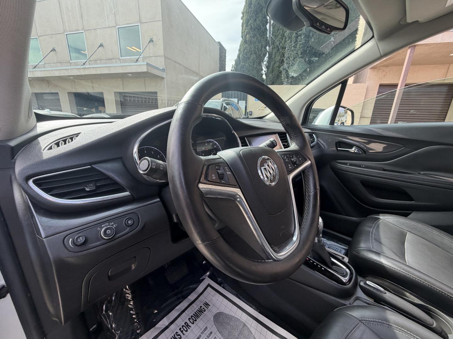 2018 Silver Buick Encore Essence AWD (KL4CJGSB7JB) with an 1.4L L4 DOHC 16V TURBO engine, 6A transmission, located at 30 S. Berkeley Avenue, Pasadena, CA, 91107, (626) 248-7567, 34.145447, -118.109398 - 2018 Buick Encore – Luxury Compact SUV – Easy Financing Available at Crown City Motors – Apply Online Today If you’re looking for a reliable, fuel-efficient, and luxury-inspired SUV with affordable Buy Here Pay Here financing, this 2018 Buick Encore is the perfect choice. At Crown City Mo - Photo#13