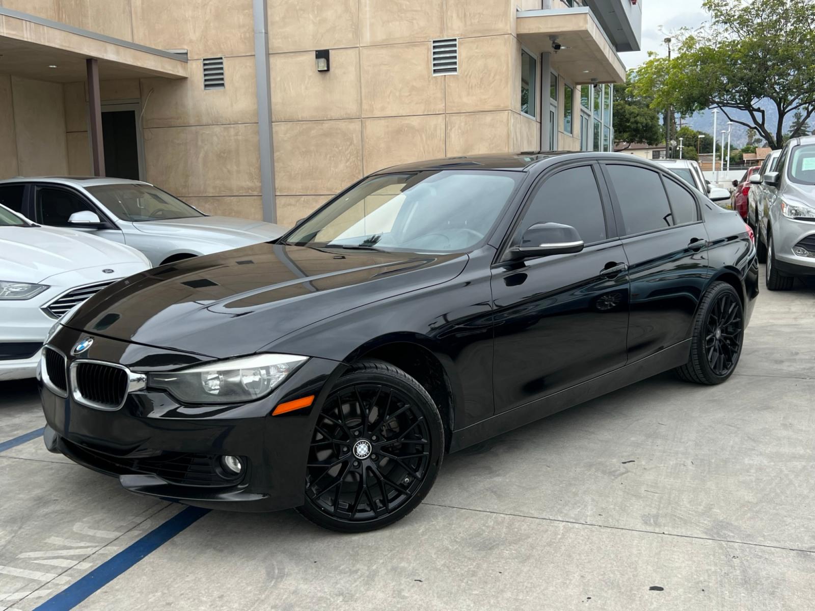 2013 Black /BLACK BMW 3-Series 328i Sedan - SULEV (WBA3C1G5XDN) with an 2.0L L4 DOHC 16V engine, Automatic transmission, located at 30 S. Berkeley Avenue, Pasadena, CA, 91107, (626) 248-7567, 34.145447, -118.109398 - Crown City Motors is a used “Buy Here Pay Here” car dealer in Pasadena CA. “Buy Here Pay Here” financing, means that when you purchase your vehicle from our dealership, that you make the payments to the dealership as well. We do not need the banks approval to get you approved for a used auto - Photo #0