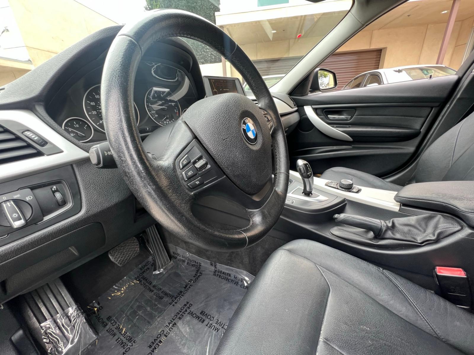 2013 Black /BLACK BMW 3-Series 328i Sedan - SULEV (WBA3C1G5XDN) with an 2.0L L4 DOHC 16V engine, Automatic transmission, located at 30 S. Berkeley Avenue, Pasadena, CA, 91107, (626) 248-7567, 34.145447, -118.109398 - Crown City Motors is a used “Buy Here Pay Here” car dealer in Pasadena CA. “Buy Here Pay Here” financing, means that when you purchase your vehicle from our dealership, that you make the payments to the dealership as well. We do not need the banks approval to get you approved for a used auto - Photo #8