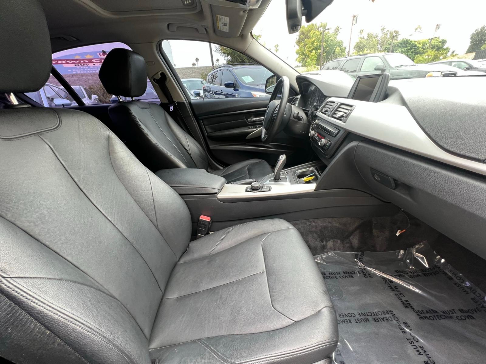 2013 Black /BLACK BMW 3-Series 328i Sedan - SULEV (WBA3C1G5XDN) with an 2.0L L4 DOHC 16V engine, Automatic transmission, located at 30 S. Berkeley Avenue, Pasadena, CA, 91107, (626) 248-7567, 34.145447, -118.109398 - Crown City Motors is a used “Buy Here Pay Here” car dealer in Pasadena CA. “Buy Here Pay Here” financing, means that when you purchase your vehicle from our dealership, that you make the payments to the dealership as well. We do not need the banks approval to get you approved for a used auto - Photo #11