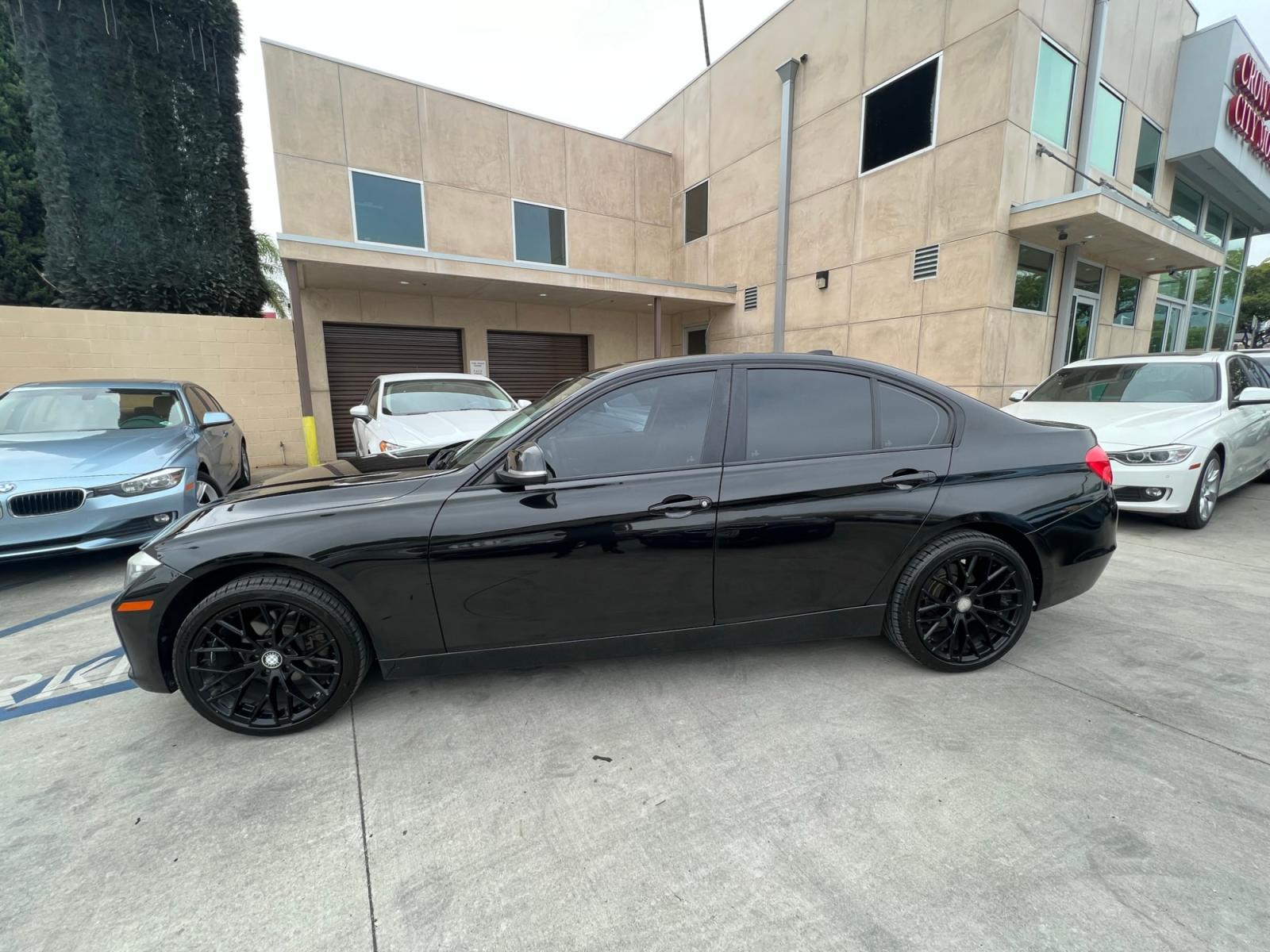 2013 Black /BLACK BMW 3-Series 328i Sedan - SULEV (WBA3C1G5XDN) with an 2.0L L4 DOHC 16V engine, Automatic transmission, located at 30 S. Berkeley Avenue, Pasadena, CA, 91107, (626) 248-7567, 34.145447, -118.109398 - Crown City Motors is a used “Buy Here Pay Here” car dealer in Pasadena CA. “Buy Here Pay Here” financing, means that when you purchase your vehicle from our dealership, that you make the payments to the dealership as well. We do not need the banks approval to get you approved for a used auto - Photo #1