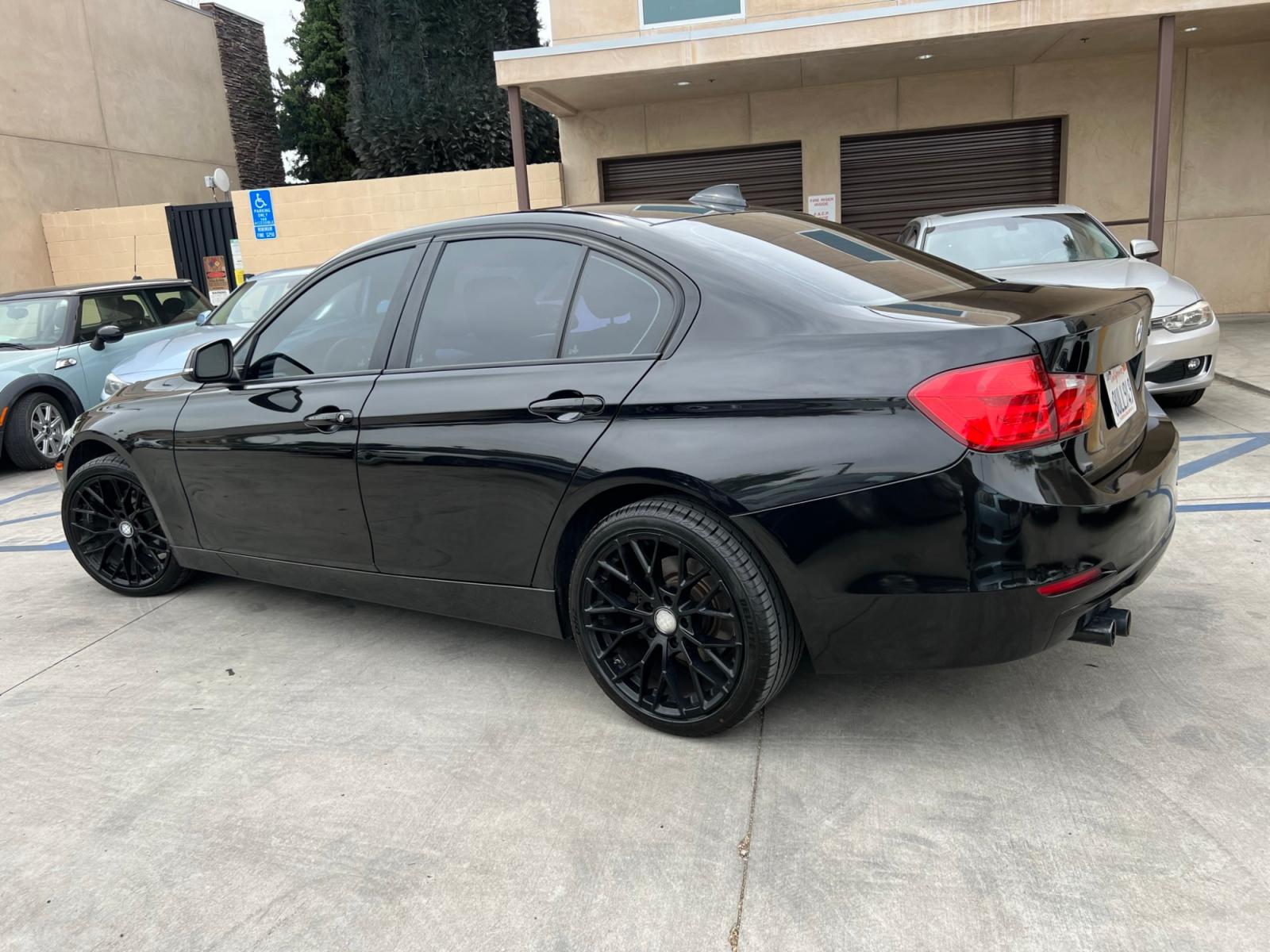 2013 Black /BLACK BMW 3-Series 328i Sedan - SULEV (WBA3C1G5XDN) with an 2.0L L4 DOHC 16V engine, Automatic transmission, located at 30 S. Berkeley Avenue, Pasadena, CA, 91107, (626) 248-7567, 34.145447, -118.109398 - Crown City Motors is a used “Buy Here Pay Here” car dealer in Pasadena CA. “Buy Here Pay Here” financing, means that when you purchase your vehicle from our dealership, that you make the payments to the dealership as well. We do not need the banks approval to get you approved for a used auto - Photo #2