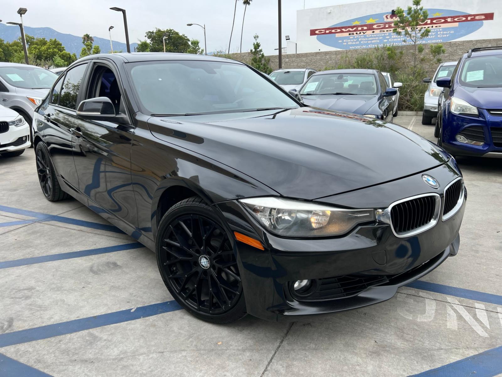 2013 Black /BLACK BMW 3-Series 328i Sedan - SULEV (WBA3C1G5XDN) with an 2.0L L4 DOHC 16V engine, Automatic transmission, located at 30 S. Berkeley Avenue, Pasadena, CA, 91107, (626) 248-7567, 34.145447, -118.109398 - Crown City Motors is a used “Buy Here Pay Here” car dealer in Pasadena CA. “Buy Here Pay Here” financing, means that when you purchase your vehicle from our dealership, that you make the payments to the dealership as well. We do not need the banks approval to get you approved for a used auto - Photo #4